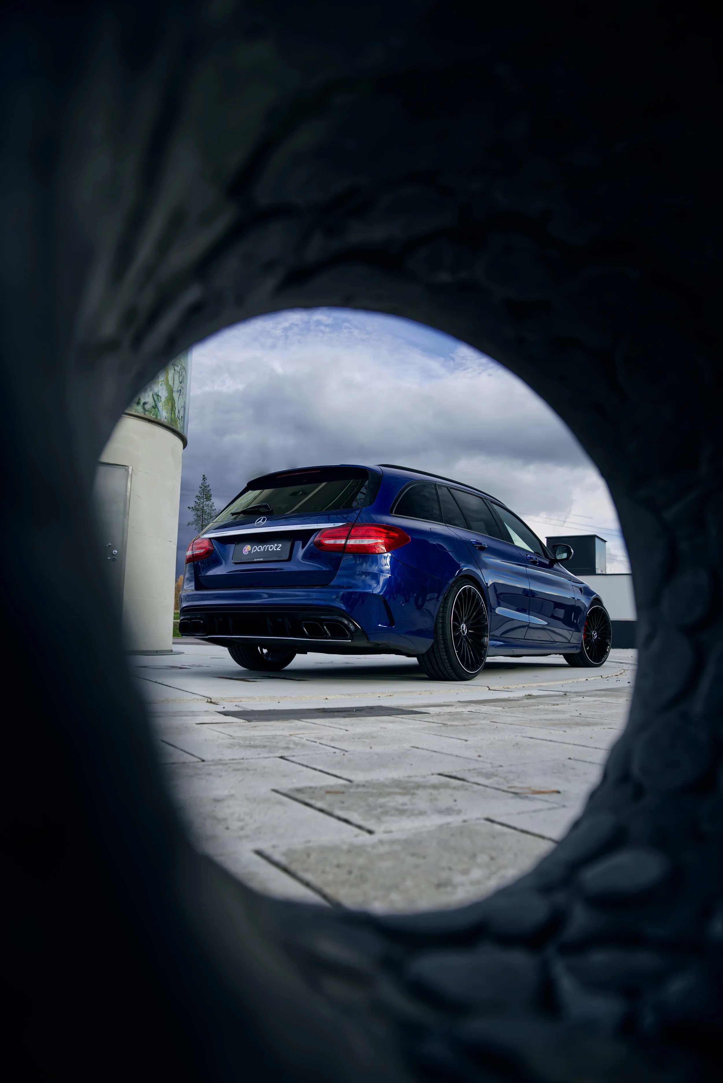 Rear of Blue Mercedes-Benz C-class car photographed by Annika TheVolvoGirl Miftakhova for Parrotz Suomi in Helsinki, Finland