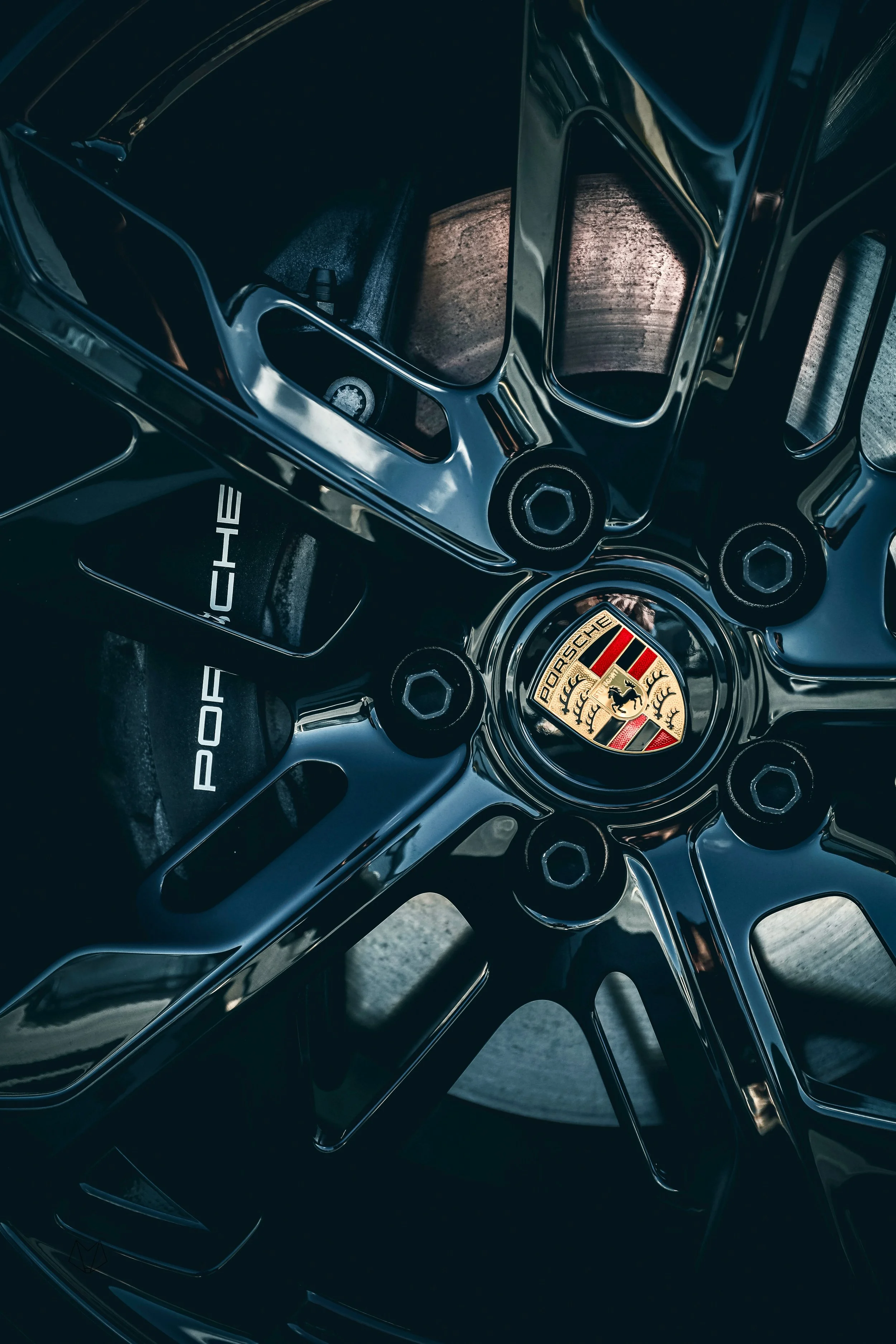 Wheel of Red Porsche Taycan Cross car photographed for Porsche Finland by Annika TheVolvoGirl Miftakhova in Helsinki, Finland