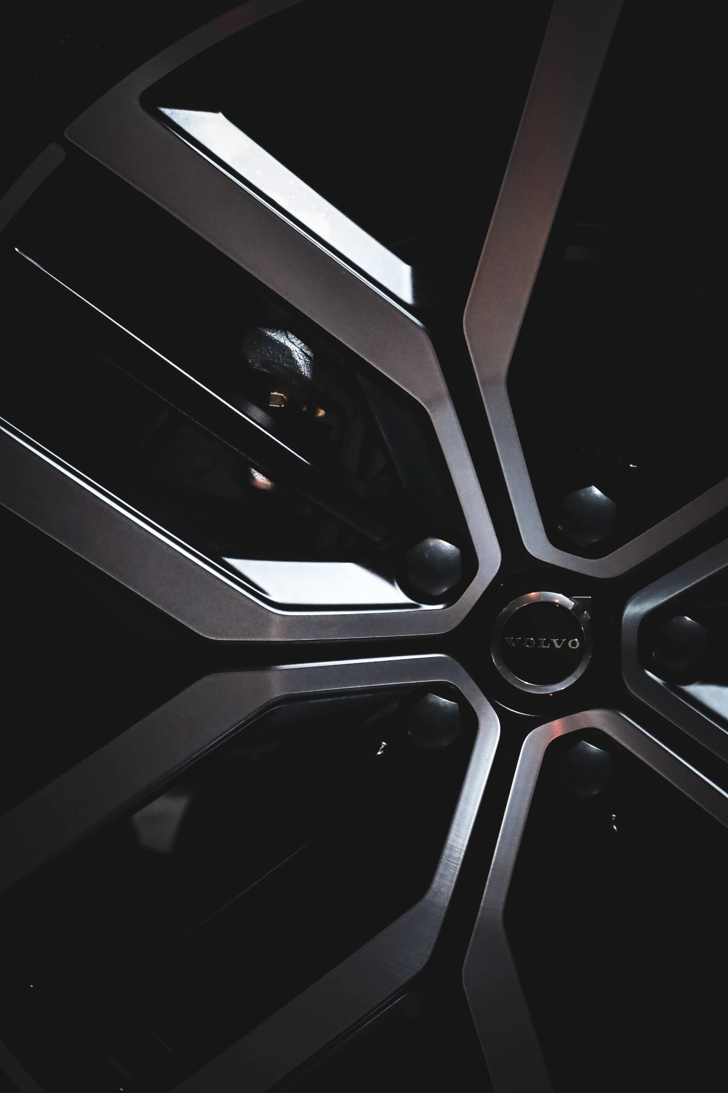 Close-up of Silver Volvo EX60 wheel design in the centre of attention at Finlandia Hall in Helsinki, Finland photographed by Annika TheVolvoGirl Miftakhova