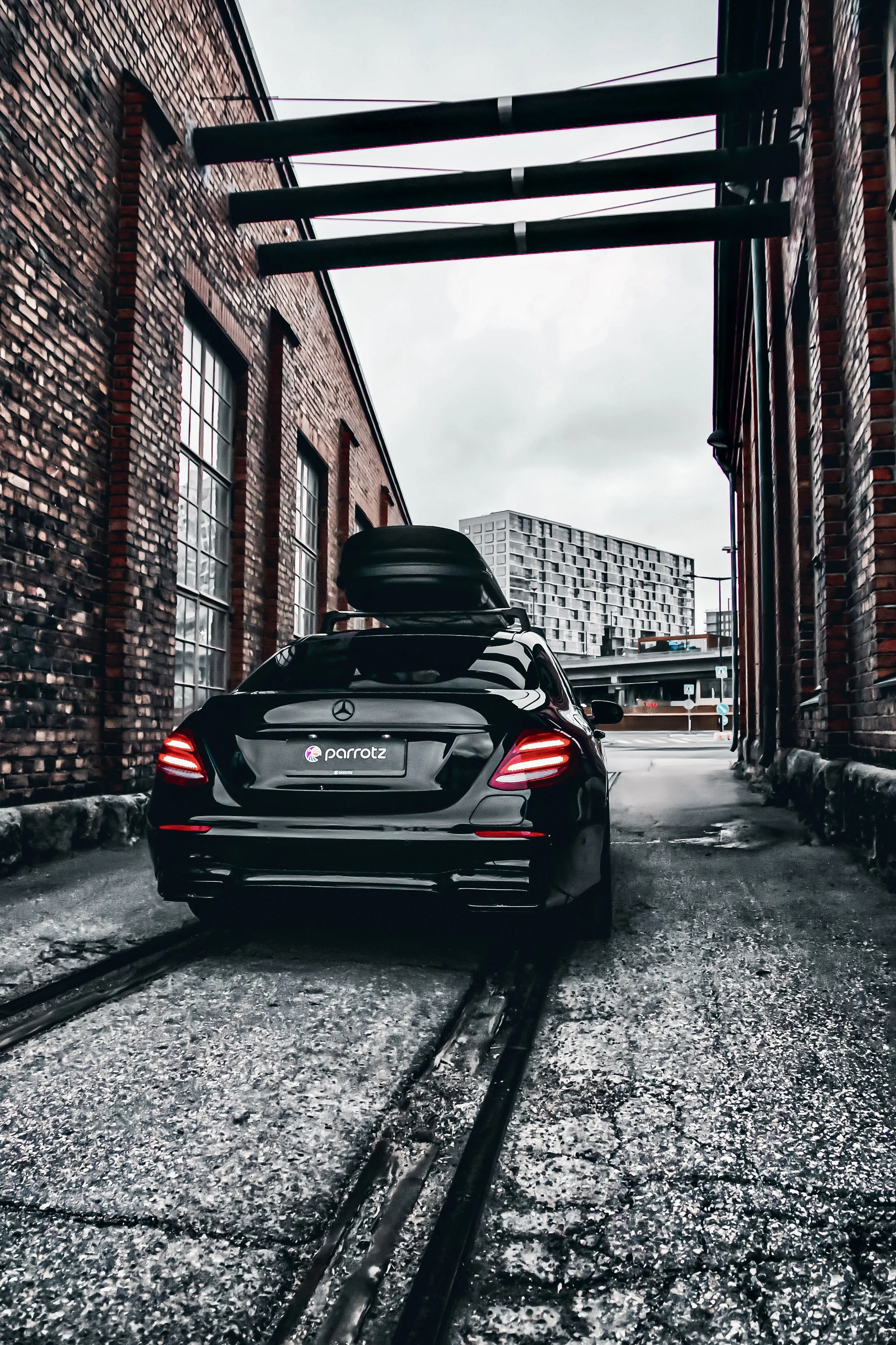 Rear of Black Mercedes-Benz E-class car photographed by Annika TheVolvoGirl Miftakhova for Parrotz Suomi in Helsinki, Finland