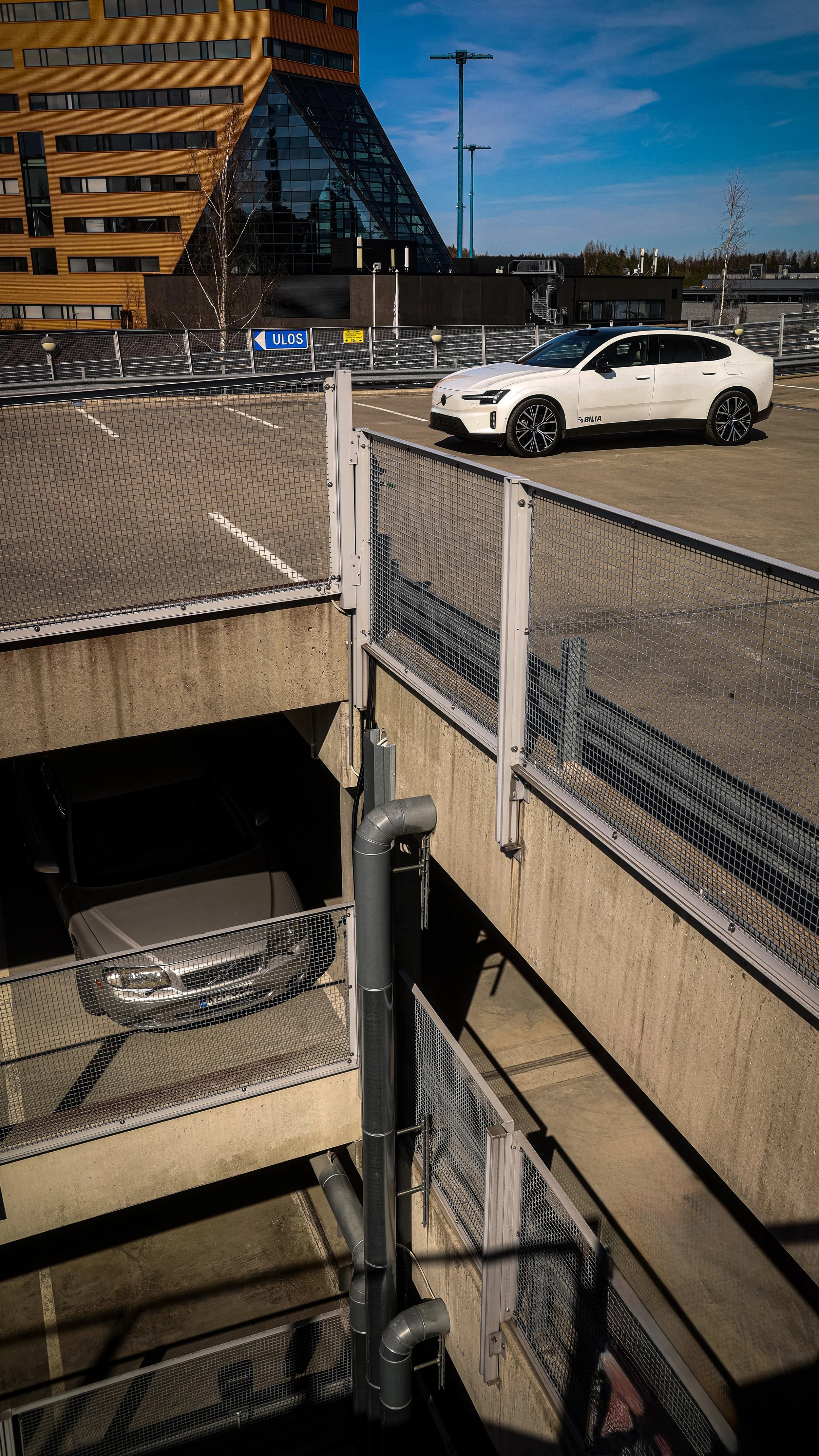 White Volvo ES90 and Volvo S80 photographed in an open parking lot in Helsinki, Finland by Annika TheVolvoGirl Miftakhova