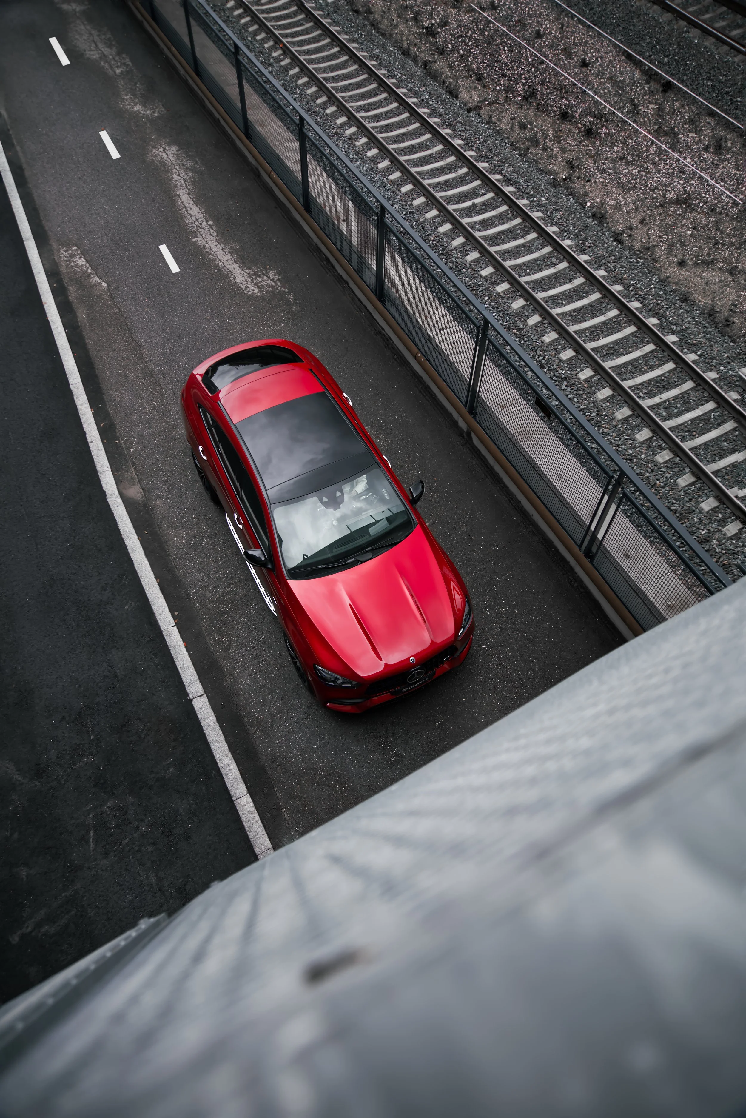 Red Mercedes-Benz GLE coupe car photographed by Annika TheVolvoGirl Miftakhova for Parrotz Suomi in Helsinki, Finland