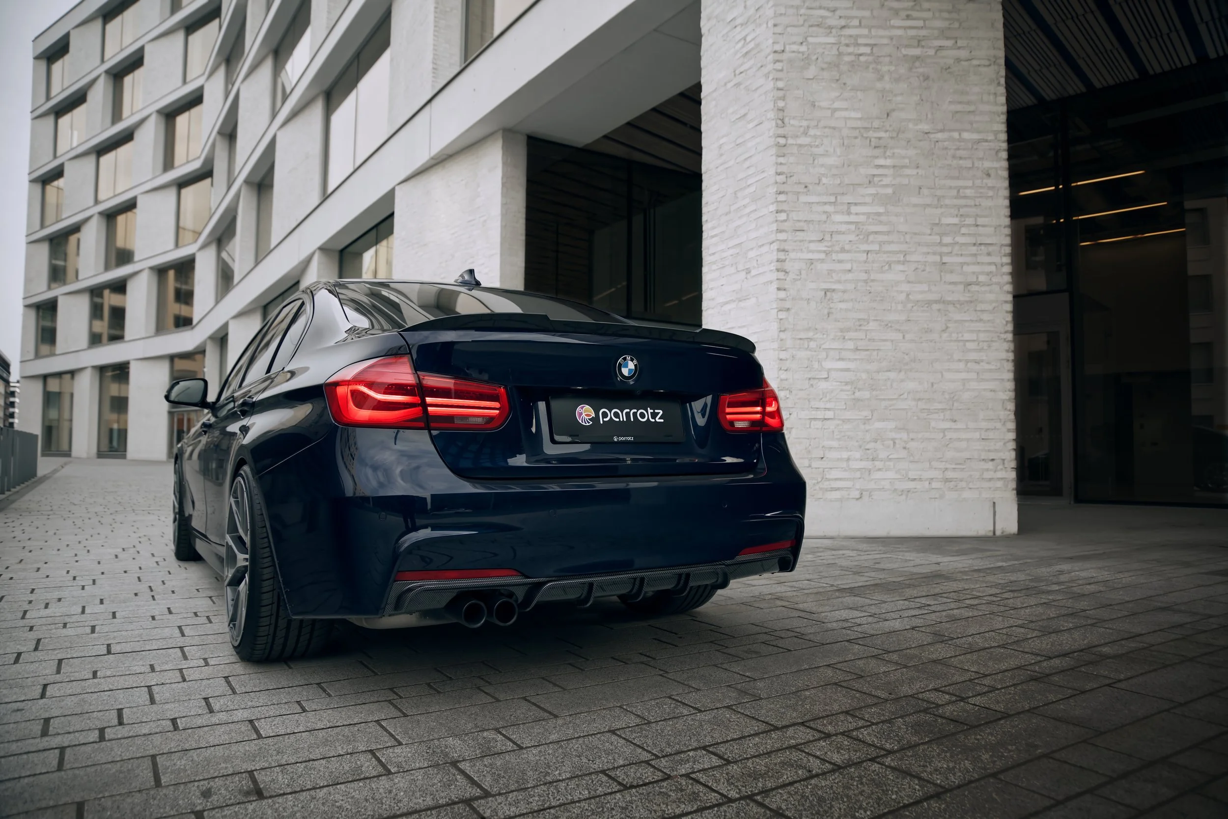 Rear of Blue BMW 3-series car photographed by Annika TheVolvoGirl Miftakhova for Parrotz Suomi in Helsinki, Finland