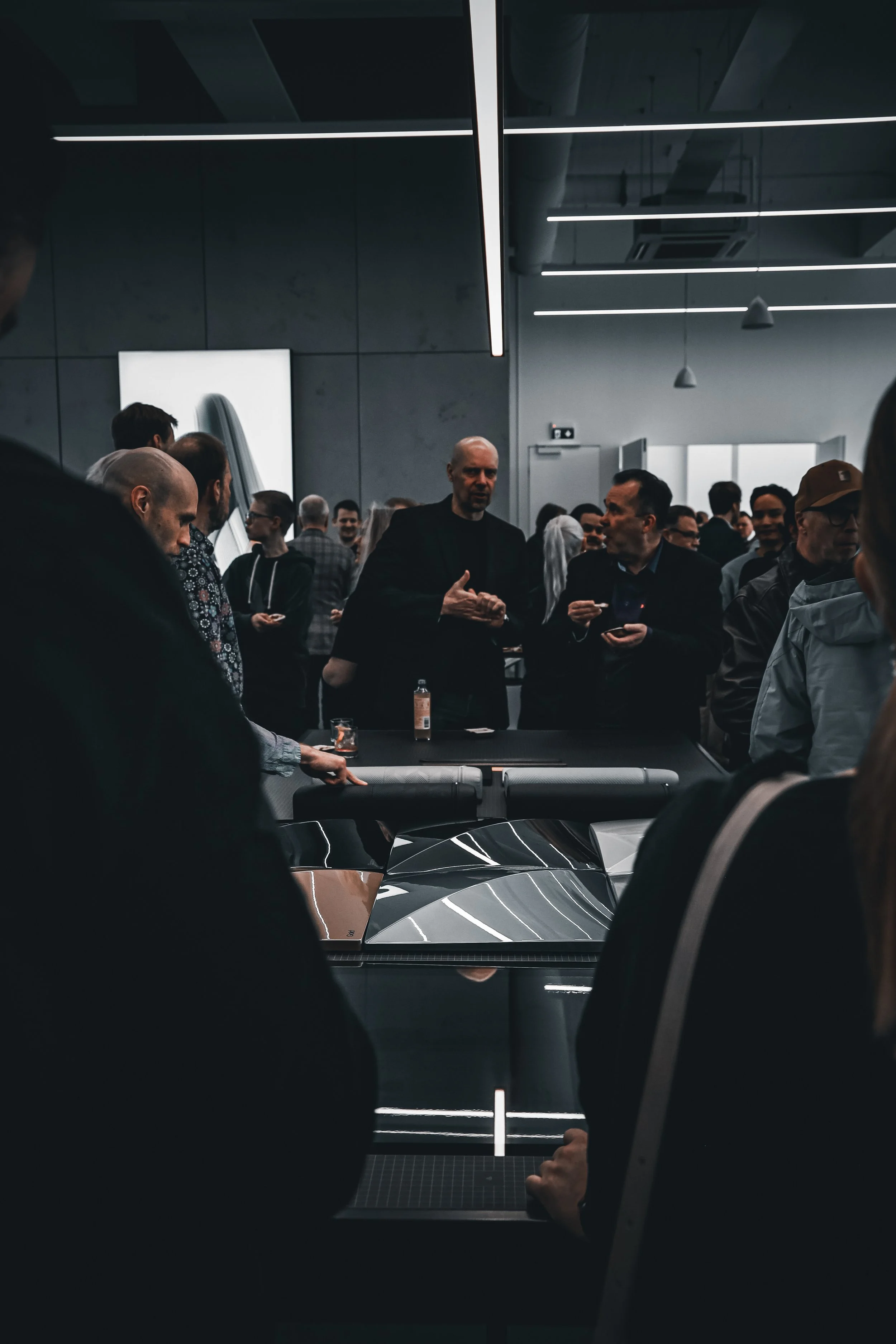 Discussion of materials at Polestar 4 launch party, photographed in Helsinki by Annika TheVolvoGirl Miftakhova