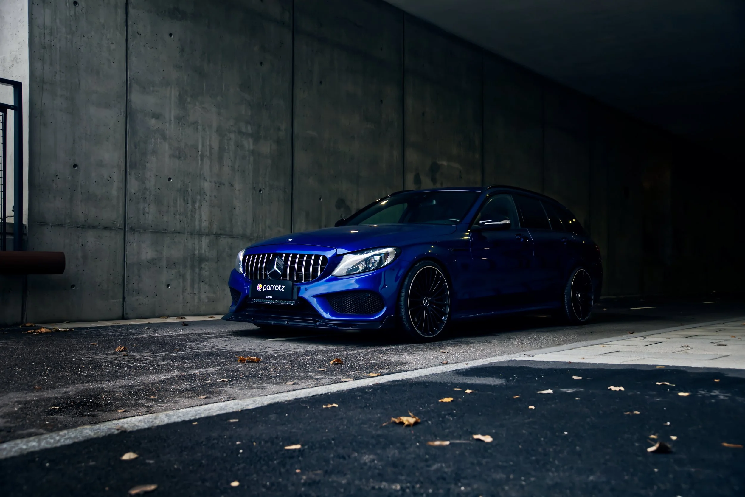 Blue Mercedes-Benz C-class car photographed by Annika TheVolvoGirl Miftakhova for Parrotz Suomi in Helsinki, Finland
