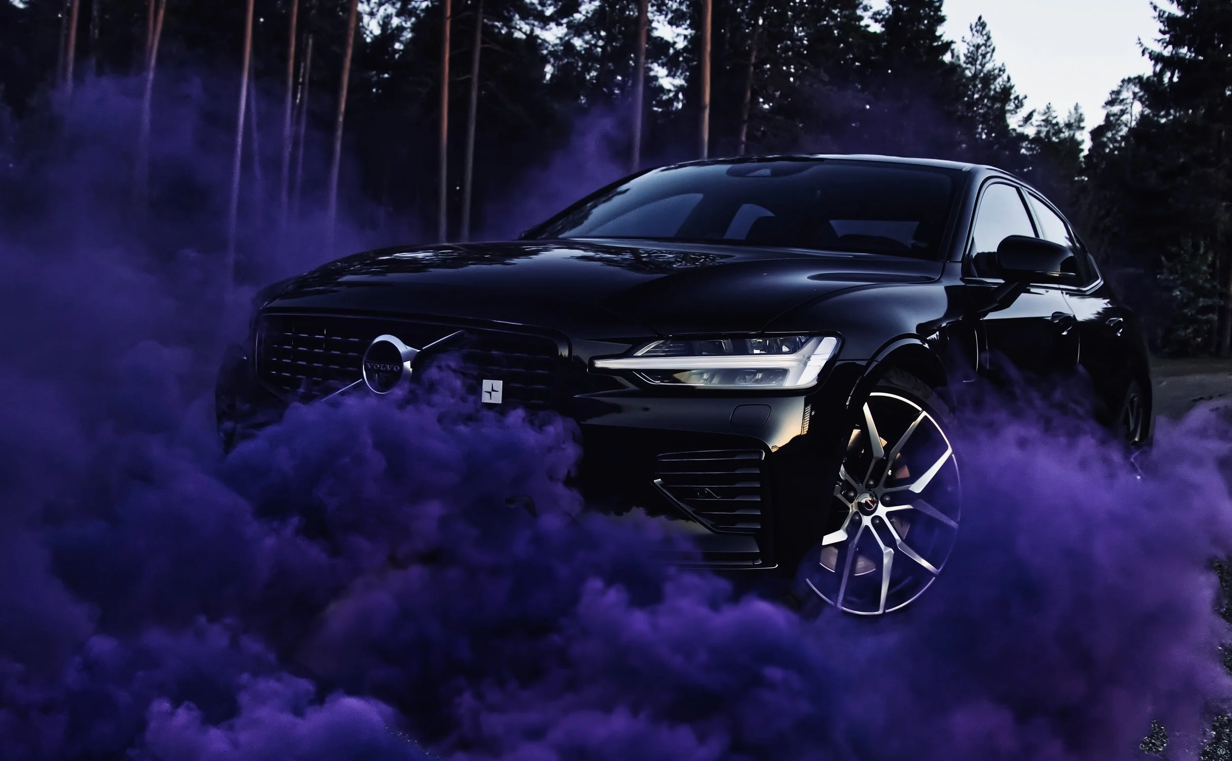 Black Volvo S60 photographed in a cloud of purple smoke in Helsinki by Annika TheVolvoGirl Miftakhova 