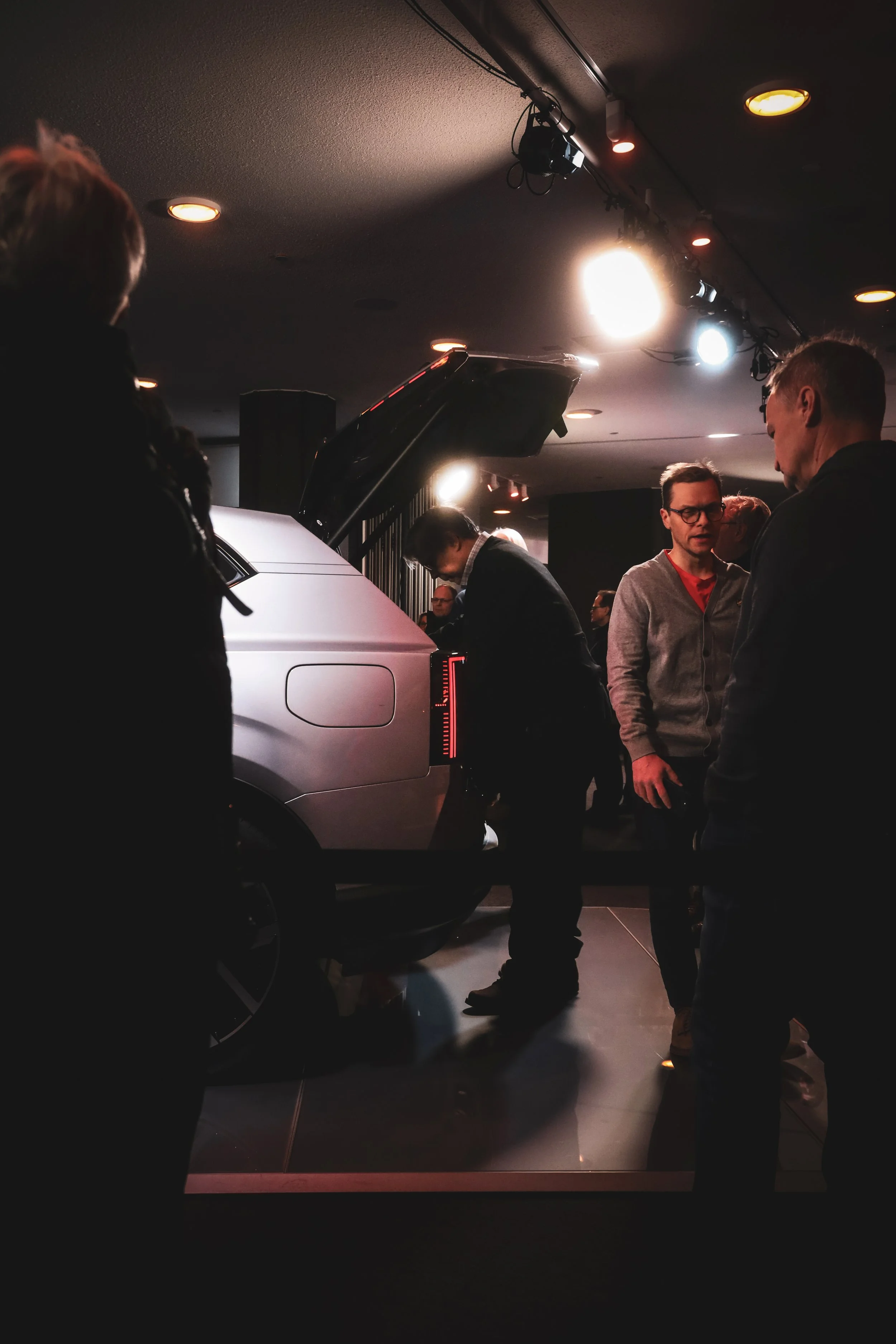 Rear of Silver Volvo EX60 in the centre of attention at Finlandia Hall in Helsinki, Finland photographed by Annika TheVolvoGirl Miftakhova