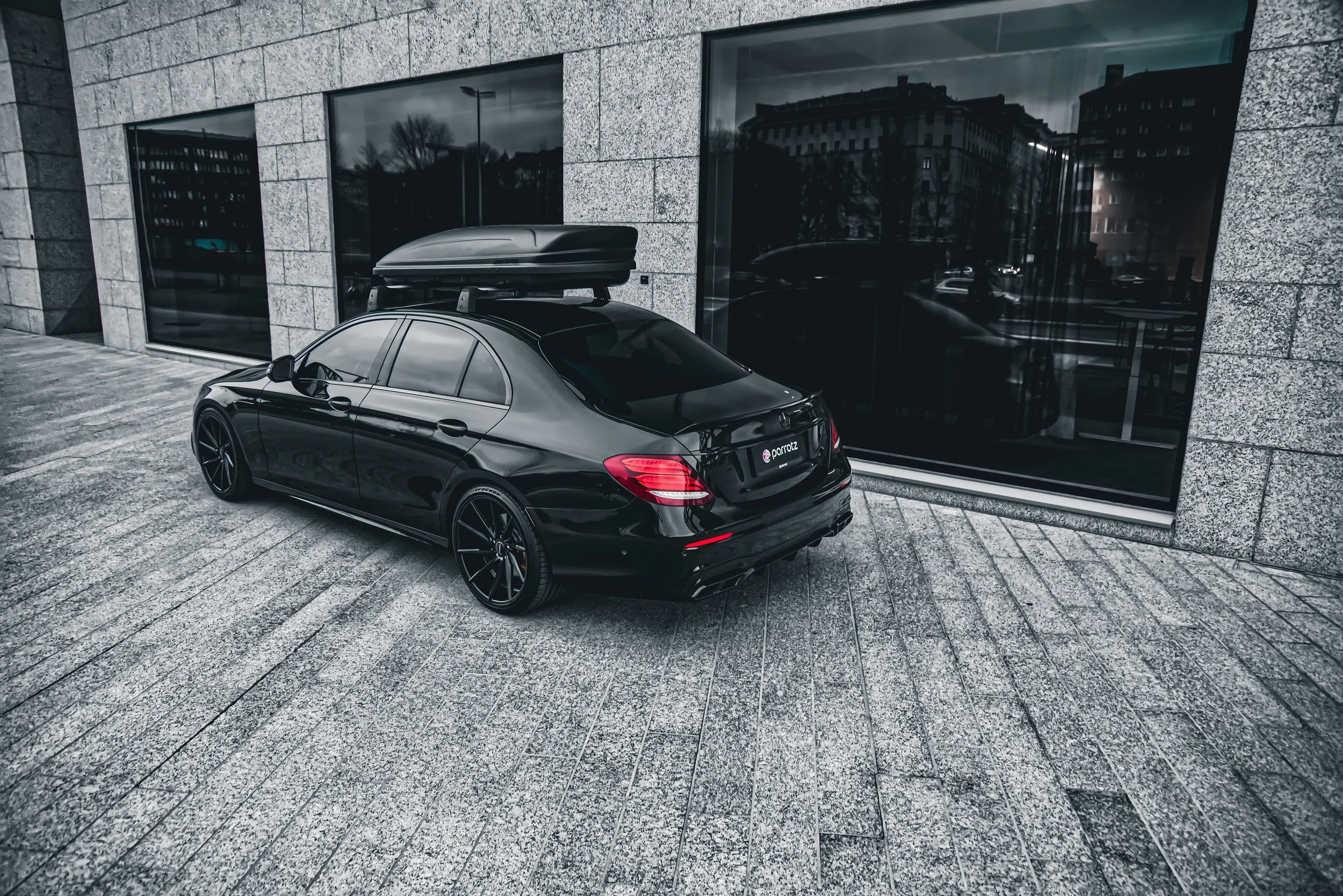 Tail of Black Mercedes-Benz E-class car photographed by Annika TheVolvoGirl Miftakhova for Parrotz Suomi in Helsinki, Finland