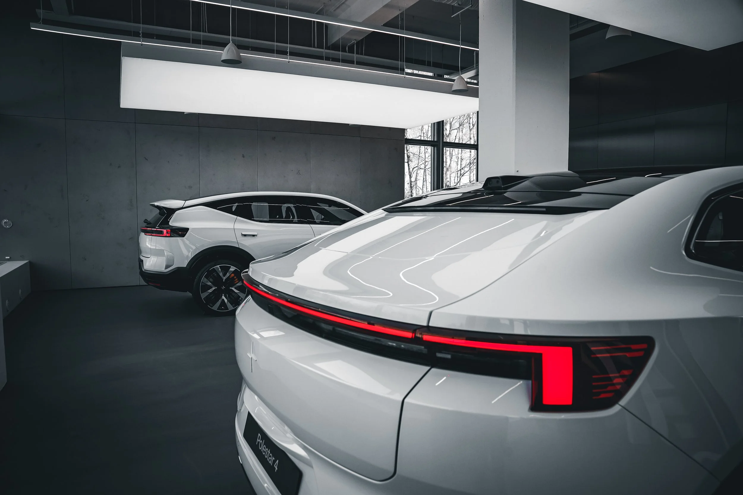 Rear of White Polestar 4 and Polestar 3 photographed in Helsinki by Annika TheVolvoGirl Miftakhova