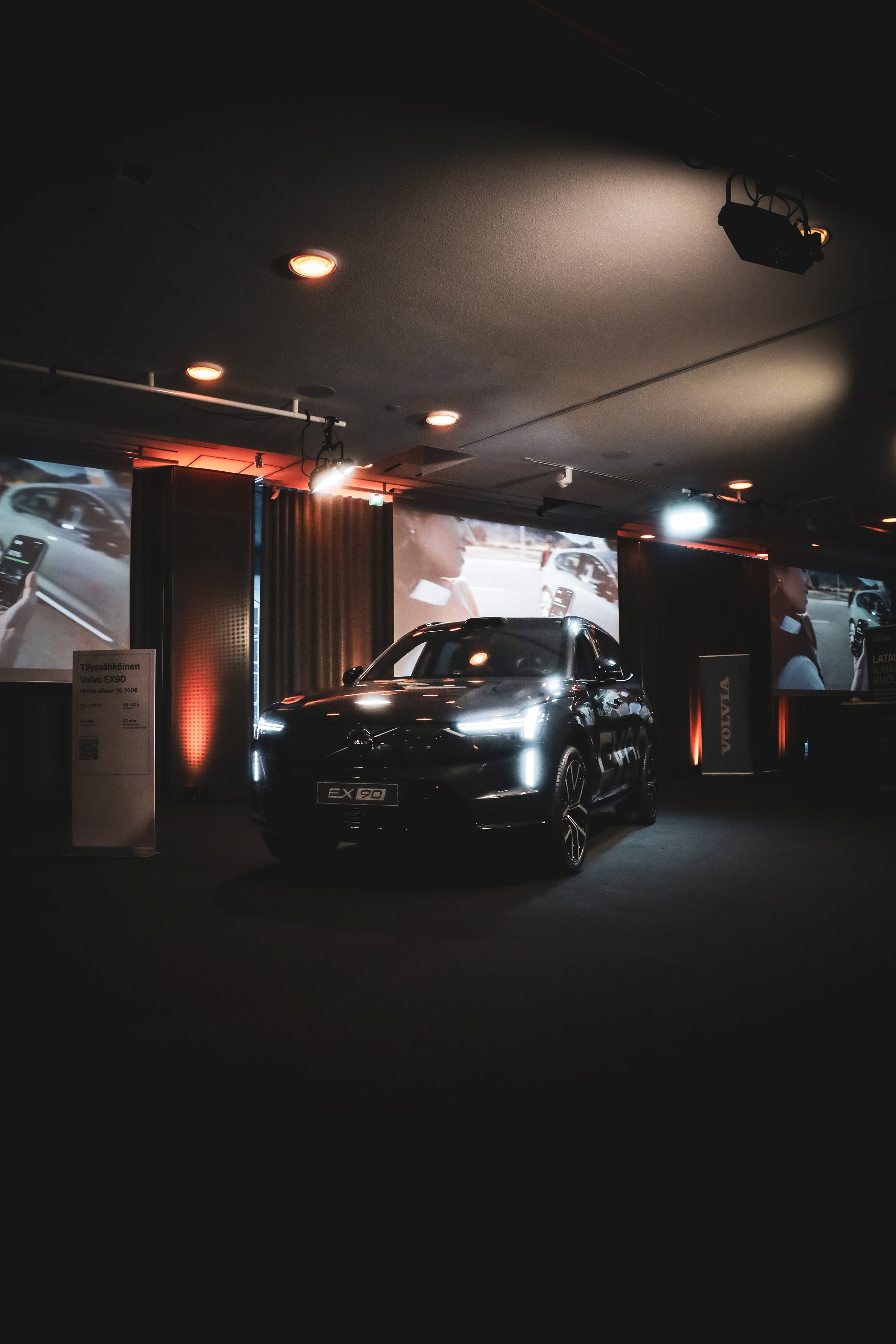 Dark Red Volvo EX90 at Finlandia Hall in Helsinki, Finland photographed by Annika TheVolvoGirl Miftakhova
