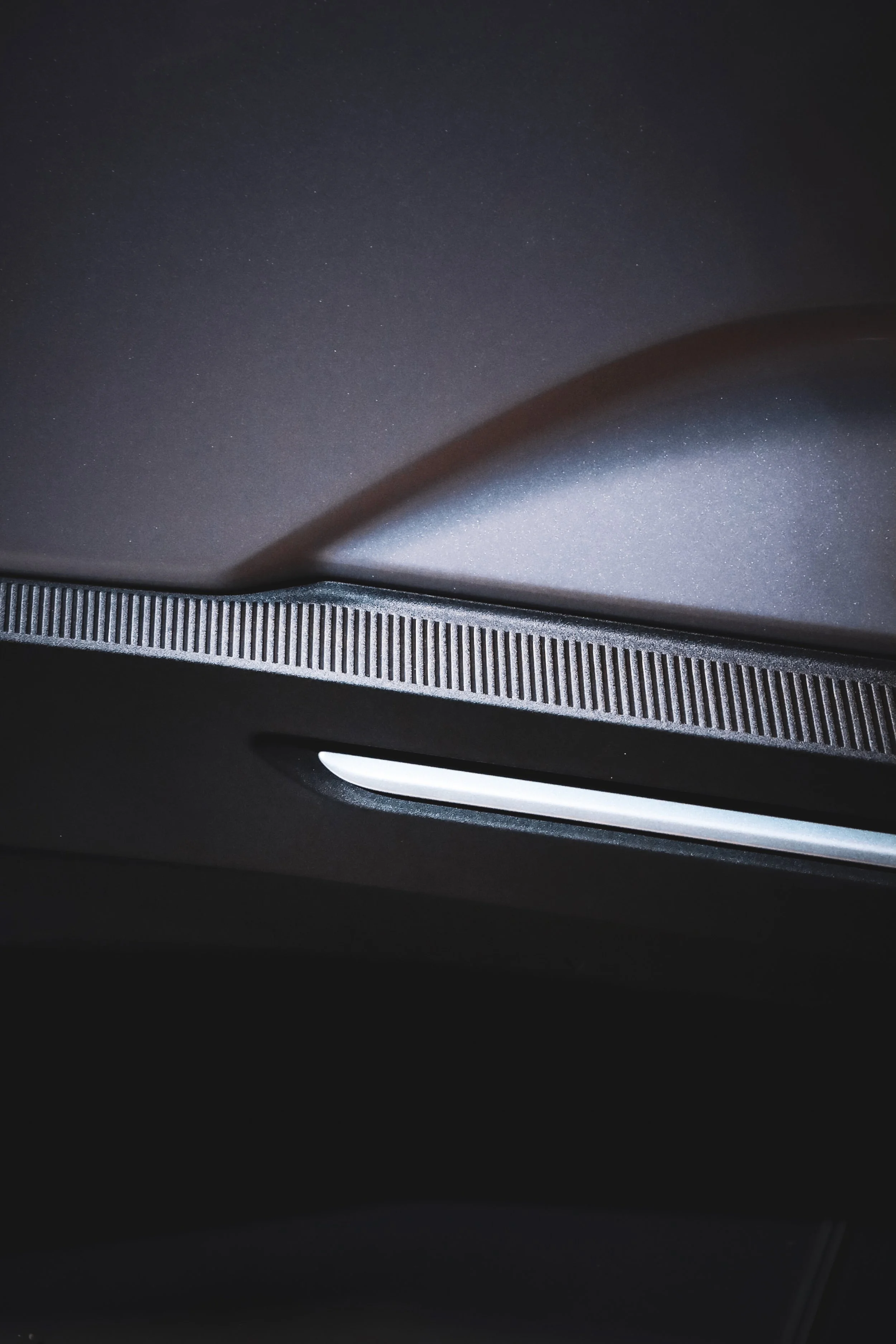 Textured details of Silver Volvo EX60 at Finlandia Hall in Helsinki, Finland photographed by Annika TheVolvoGirl Miftakhova