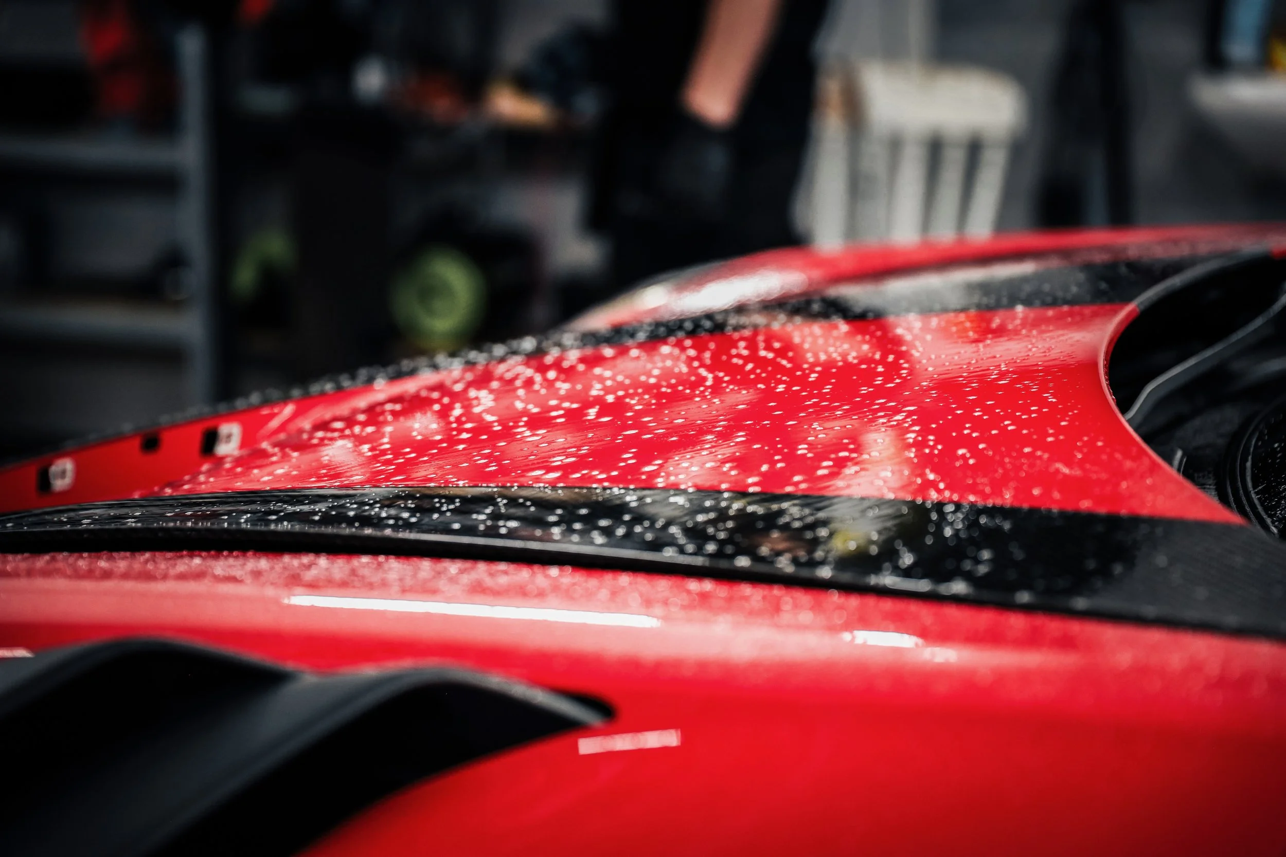 Red Porsche GT3 RS being prepared for Paint Protection Film at Wrapster Sweden in Örebro, Sweded, photographed by Annika TheVolvoGirl Miftakhova.