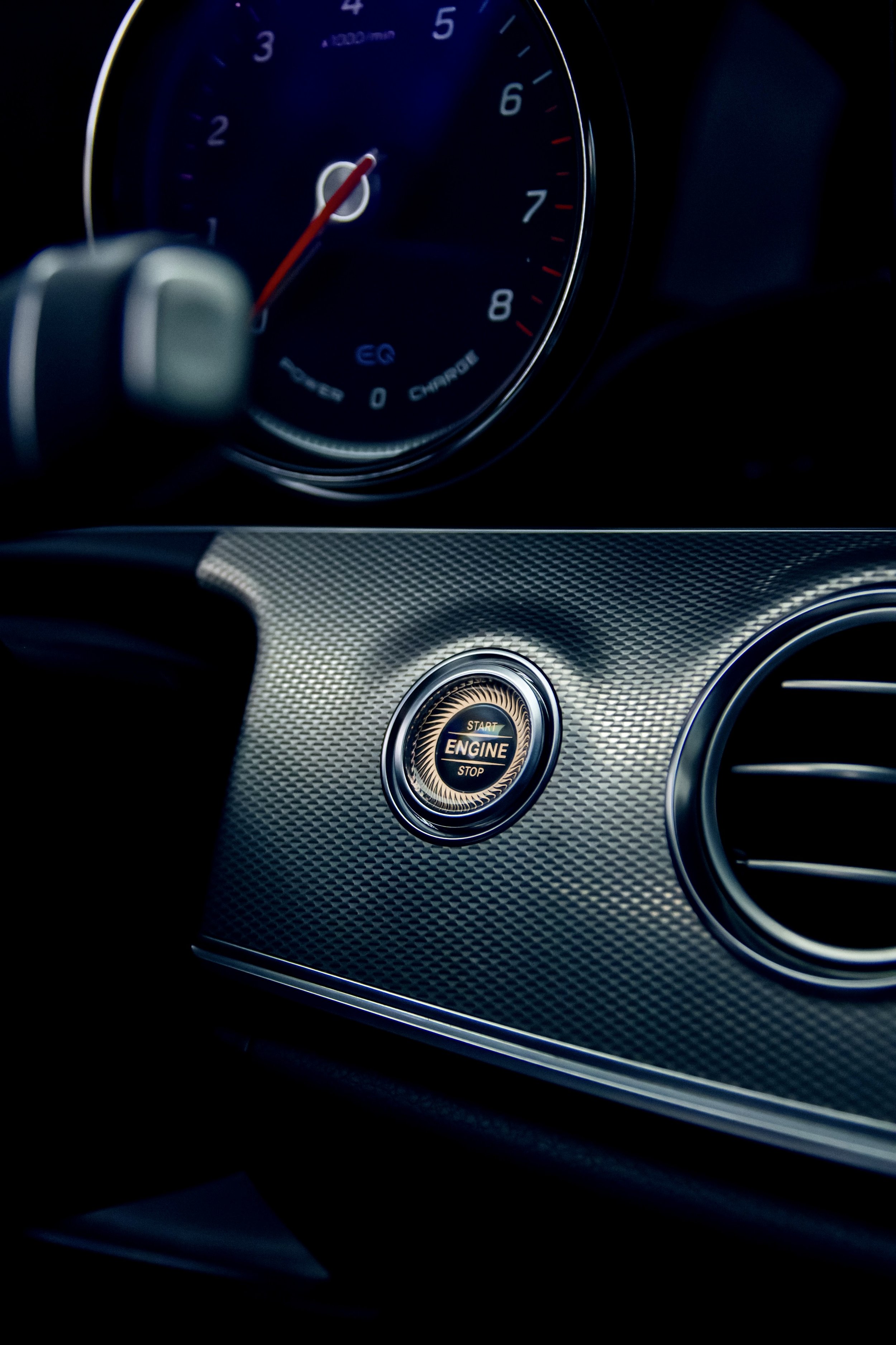 Start button of Black Mercedes-Benz E-class car photographed by Annika TheVolvoGirl Miftakhova for Parrotz Suomi in Helsinki, Finland