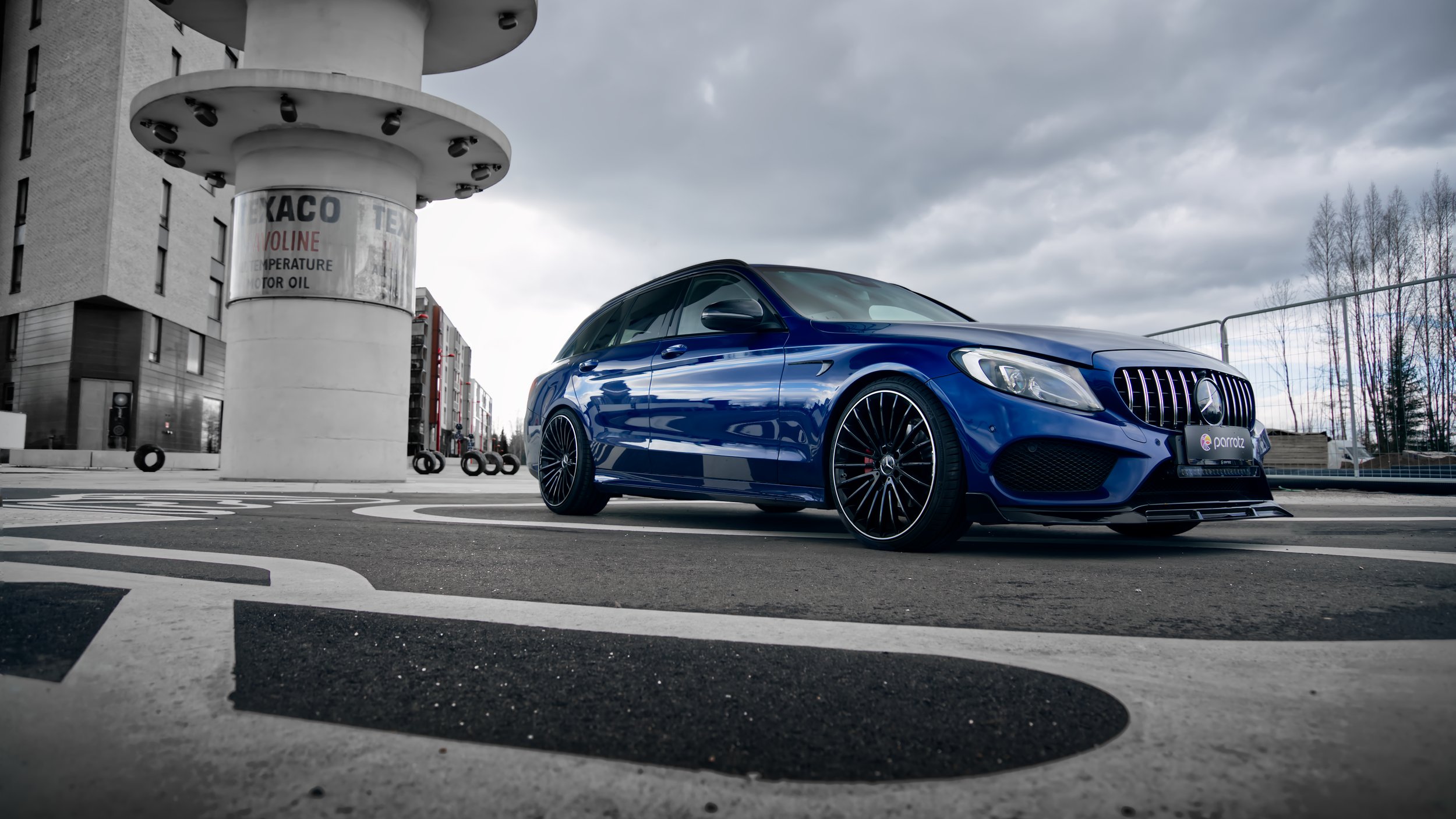 Blue Mercedes-Benz C-class car photographed by Annika TheVolvoGirl Miftakhova for Parrotz Suomi in Helsinki, Finland