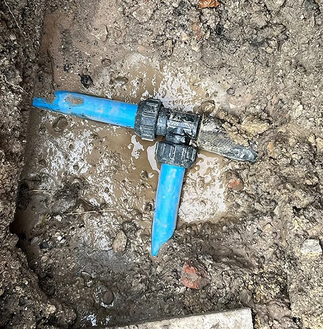 A broken blue water mains pipe which has been detected by our water leak detection engineers