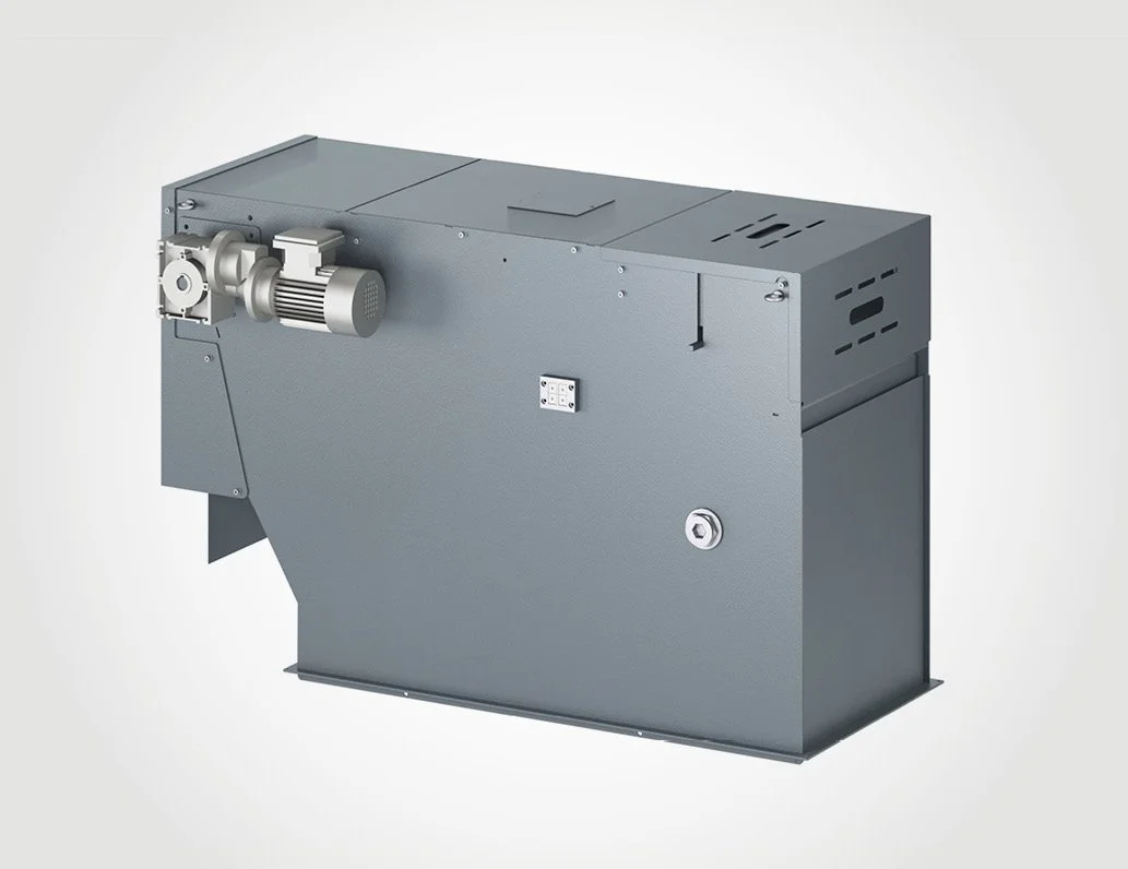 Schweres Metallgerät, möglicherweise eine industrielle Maschine oder Komponente mit Motor und Ventil auf der linken Seite.