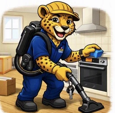 Anthropomorphic cheetah dressed as a plumber using a vacuum in a kitchen.