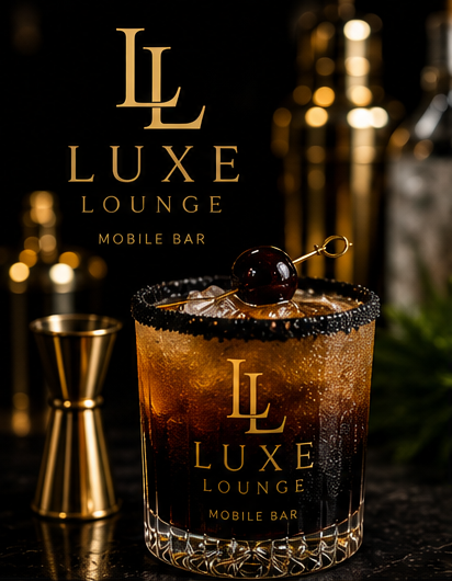 A cocktail in a glass with a salted rim and a cherry garnish, featuring a logo for L Luxe Lounge Mobile Bar, with bottles and a cocktail shaker in the background.