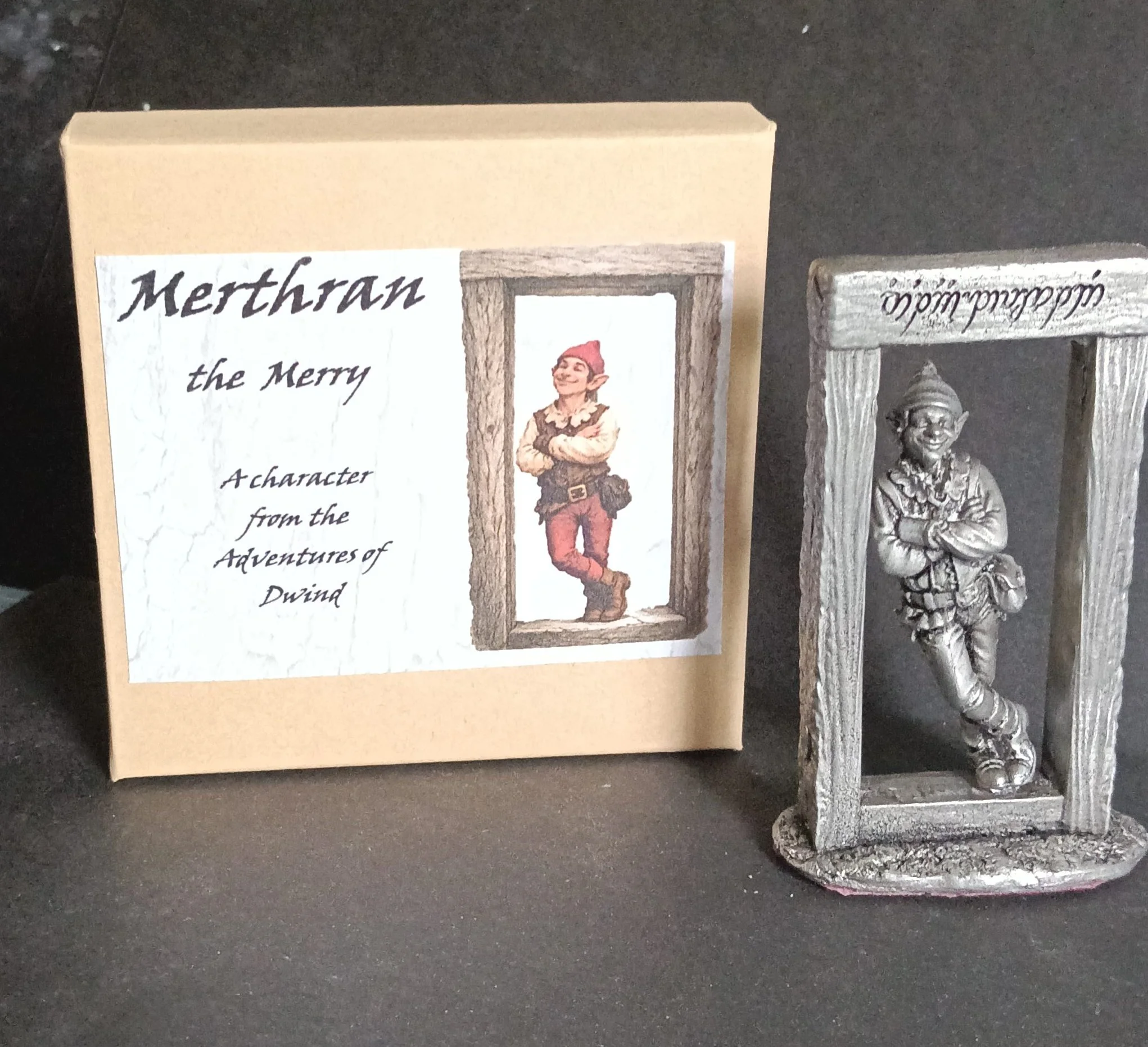A collectible life size white metal figurine of Merthran the Merry - a water elf who helps the rescue party in their search for Hawkbit the Wise in the 'Adventures of Dwind', available as a kit or as an antiqued gift.
