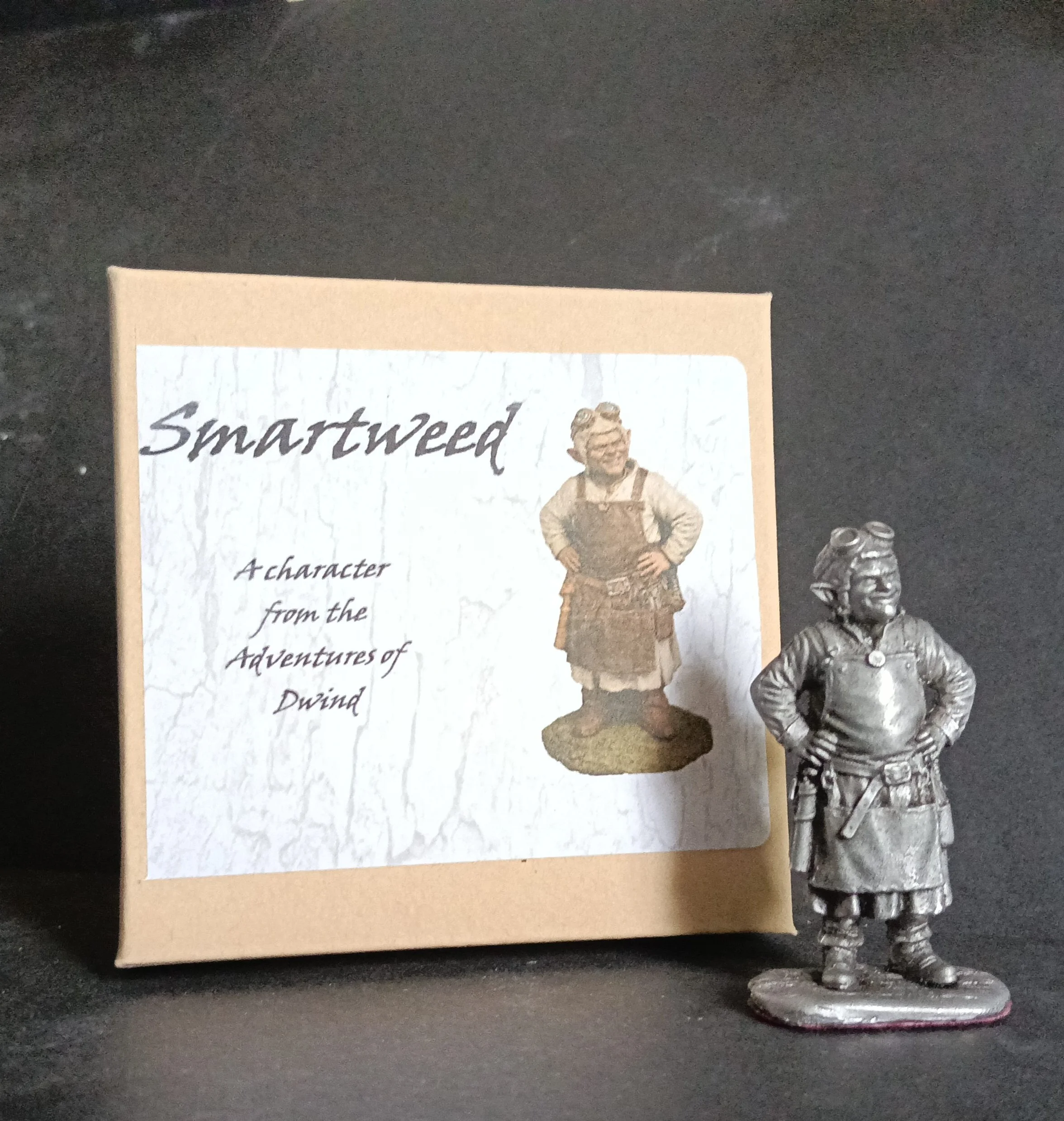 A collectible life size white metal figurine of Smartweed the inventor - a key character from the 'Adventures of Dwind', available as a kit or as an antiqued gift.