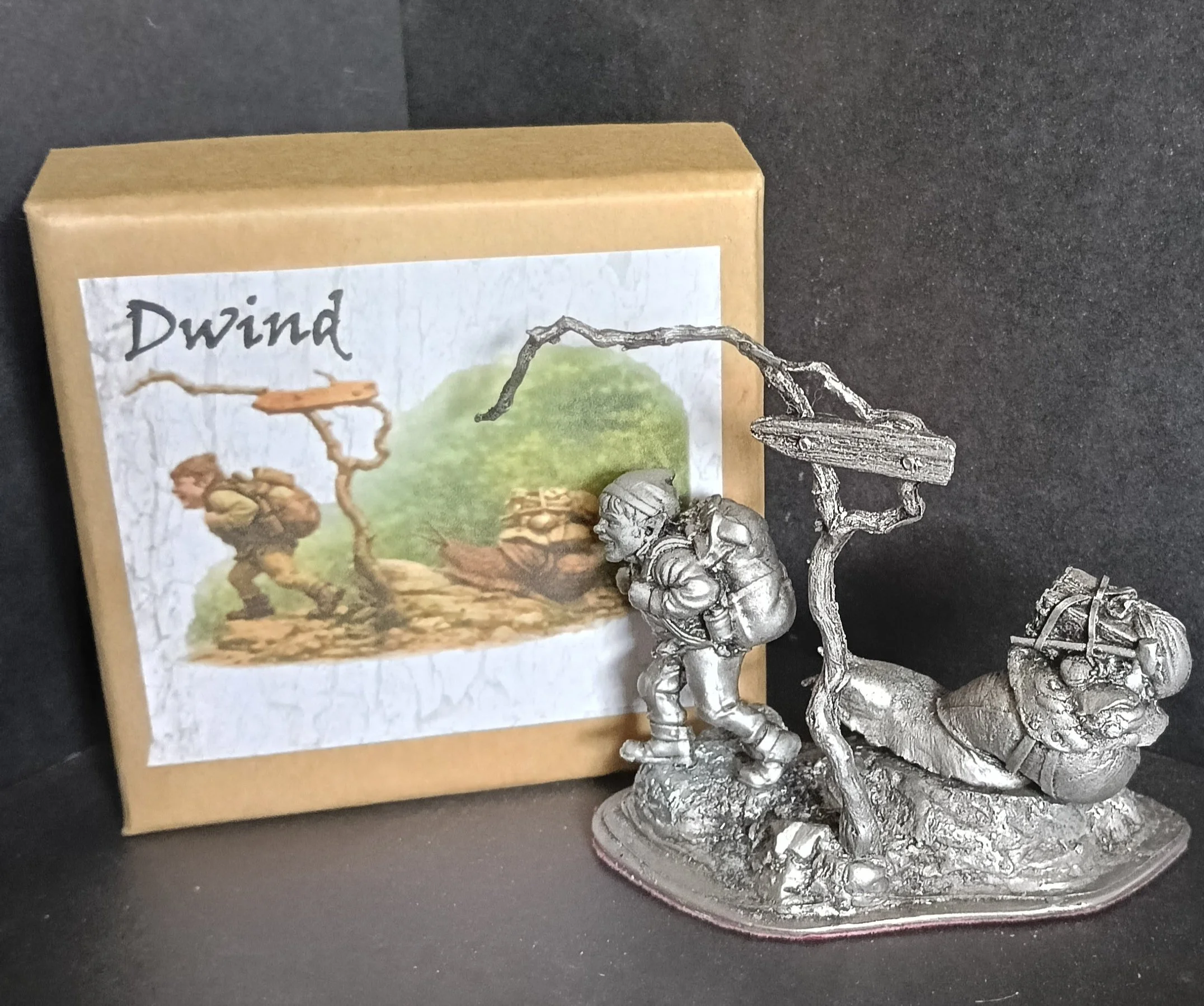 A  collectible life size white metal figurine of Dwind - apprentice to Smartweed the inventor and the central character of the 'Adventures of Dwind', available as a kit or as an antiqued gift.