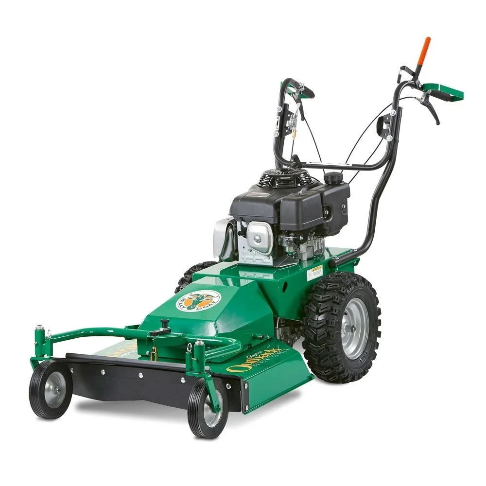 A green and black walk-behind lawn mower with large rear wheels, a black engine in the middle, and a handlebar with controls.