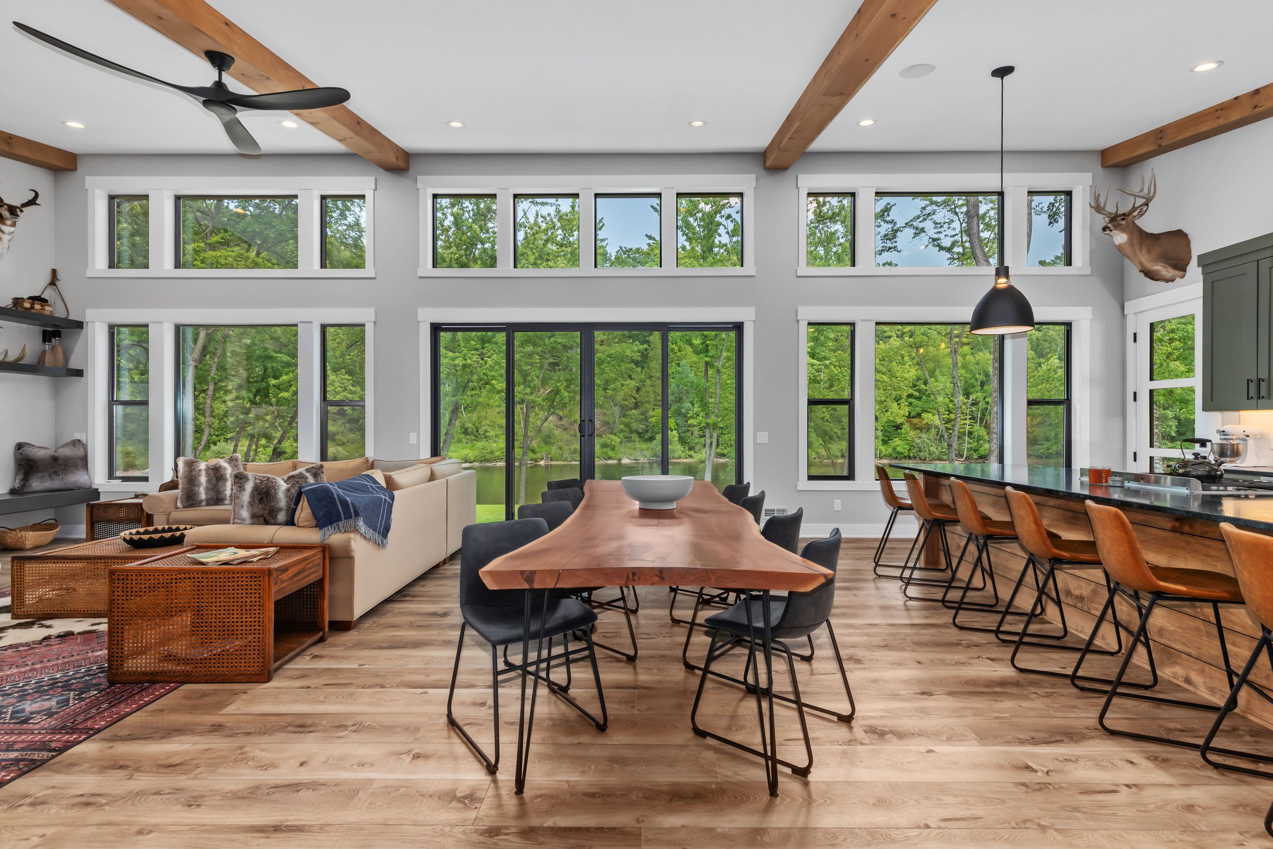 Custom built live edge Black Walnut dining table with seating for 8.