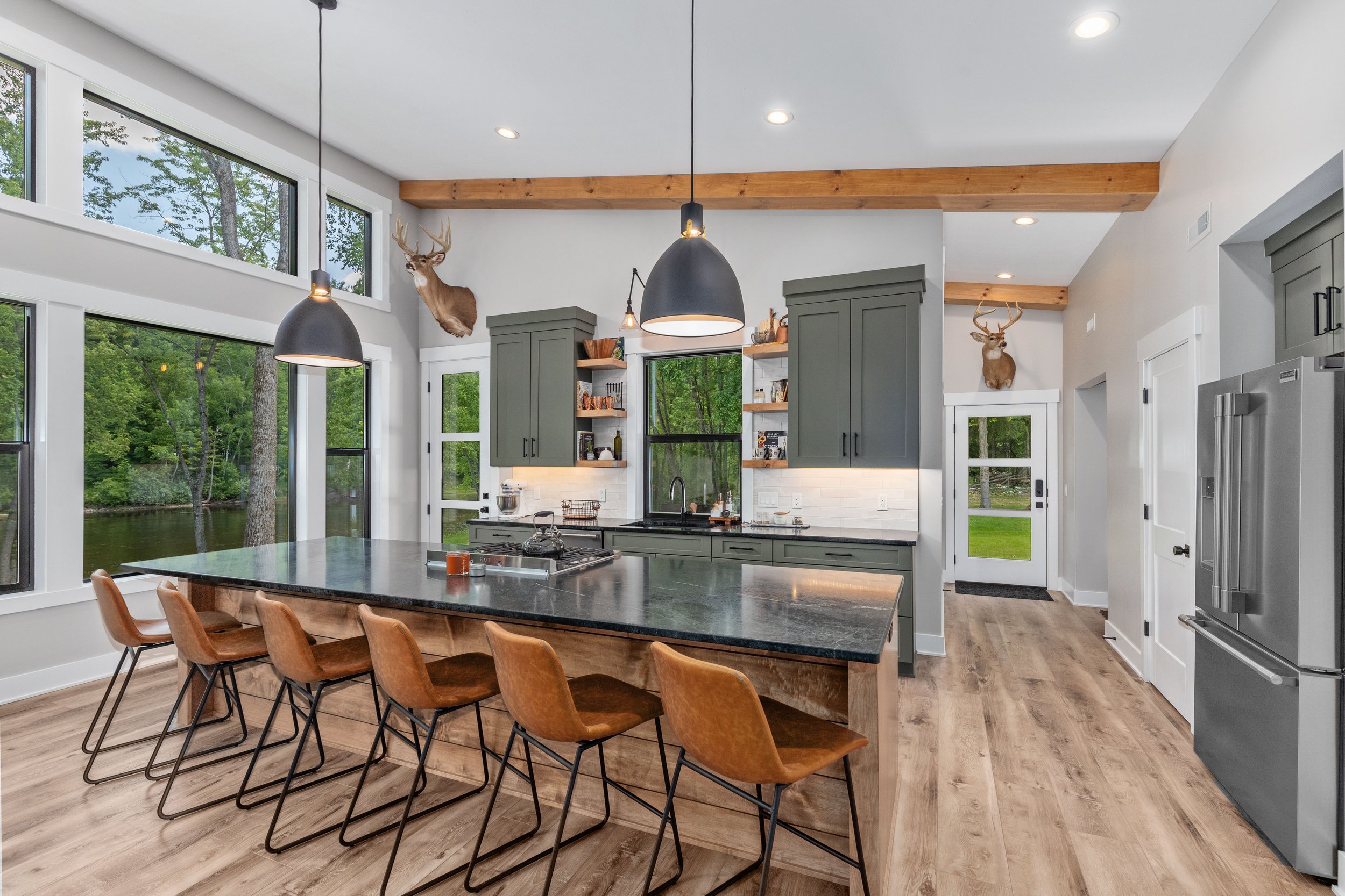 Gas range and seating for 6 at the island.