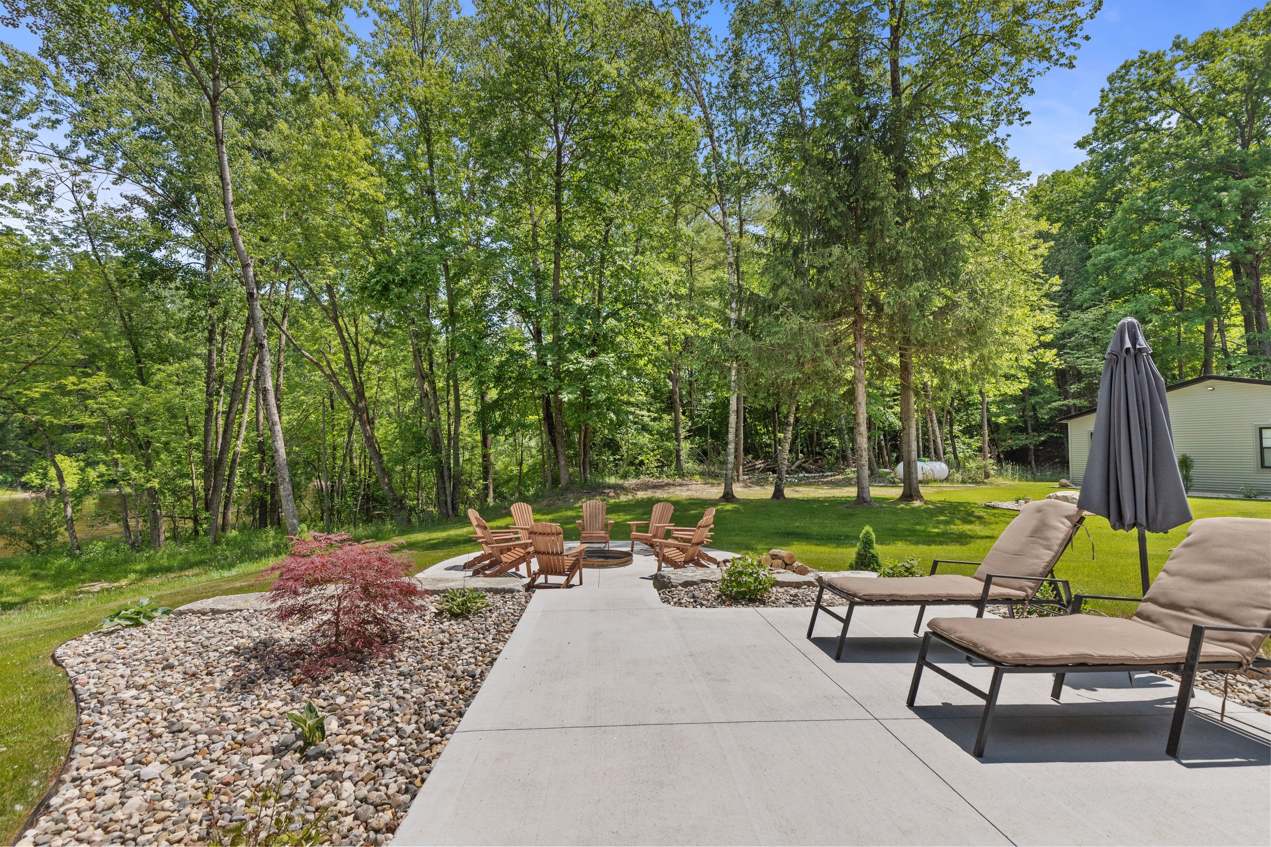Lounge chairs with riverfront views offer the perfect place to relax any time of day, from sunny afternoons to star-filled evenings.