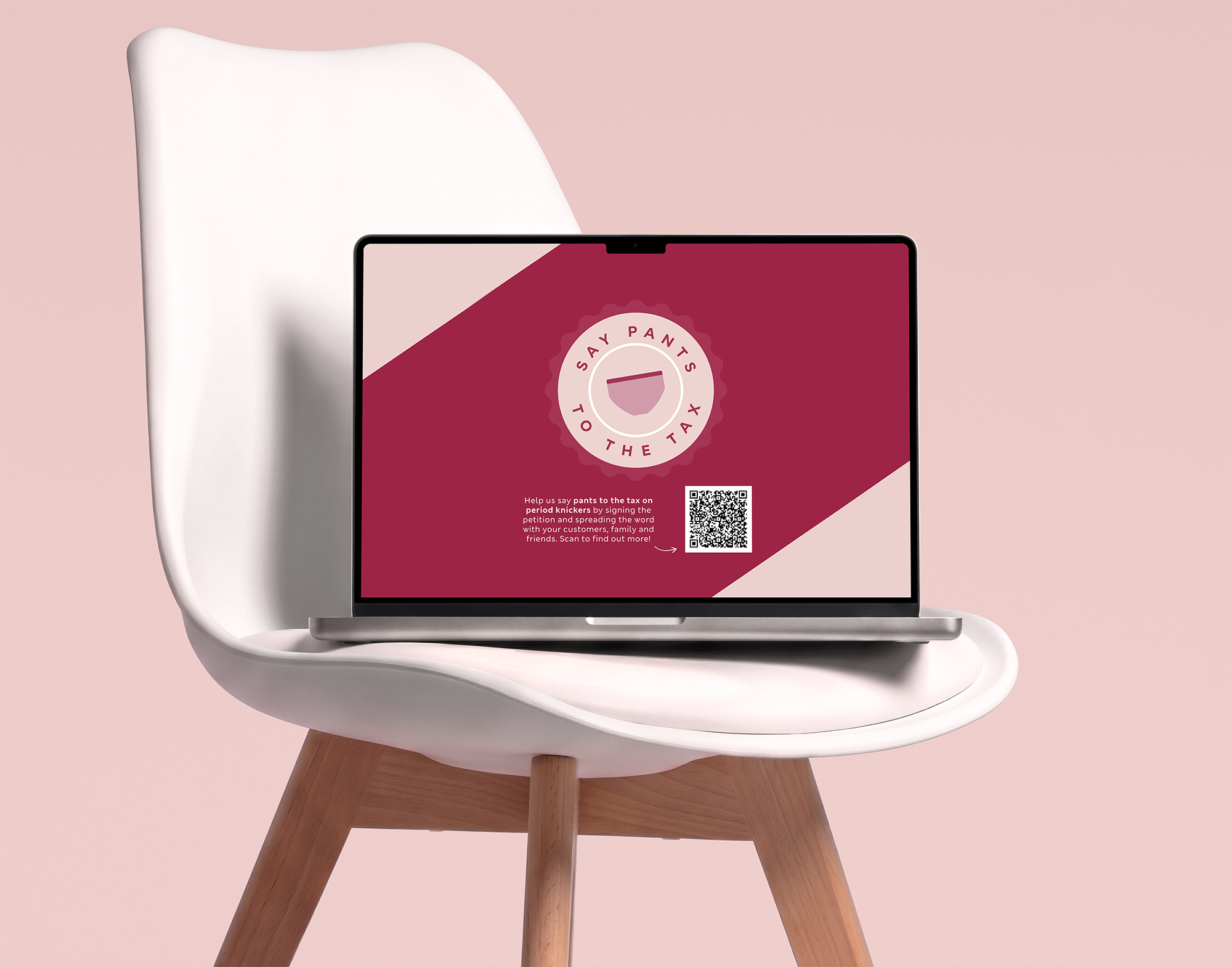 MacBook-on-Modern-Eames-Style-Chair-Presentation-Scene-PSD-Mockup.png