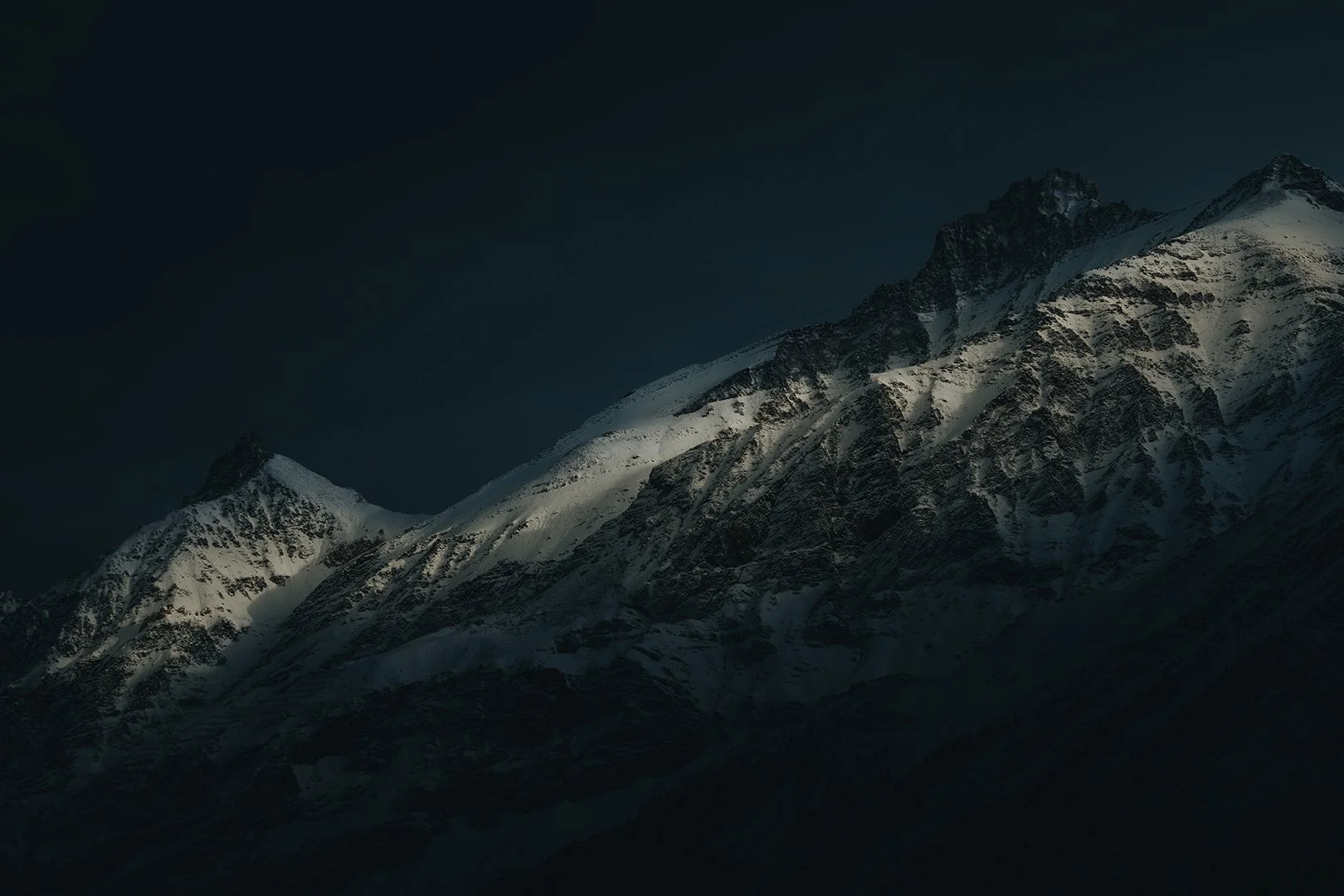 Light upon the snowy mountains