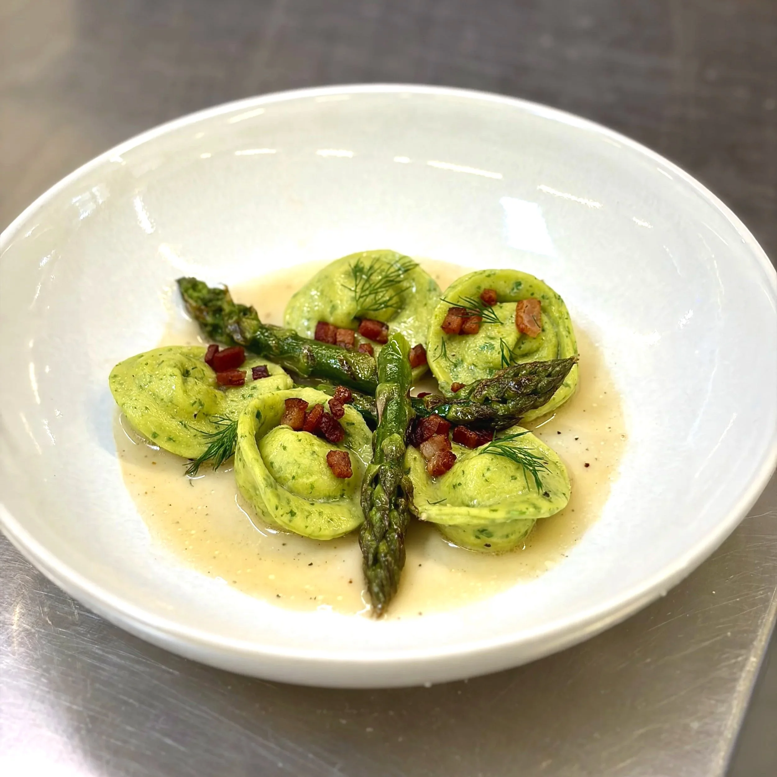 Creme+fraiche+and+crispy+pancetta+filled+herby+tortellini%2C+with+pan+fried+asparagus+and+white+wine%2C+lemon+and+herb+reduction.jpg