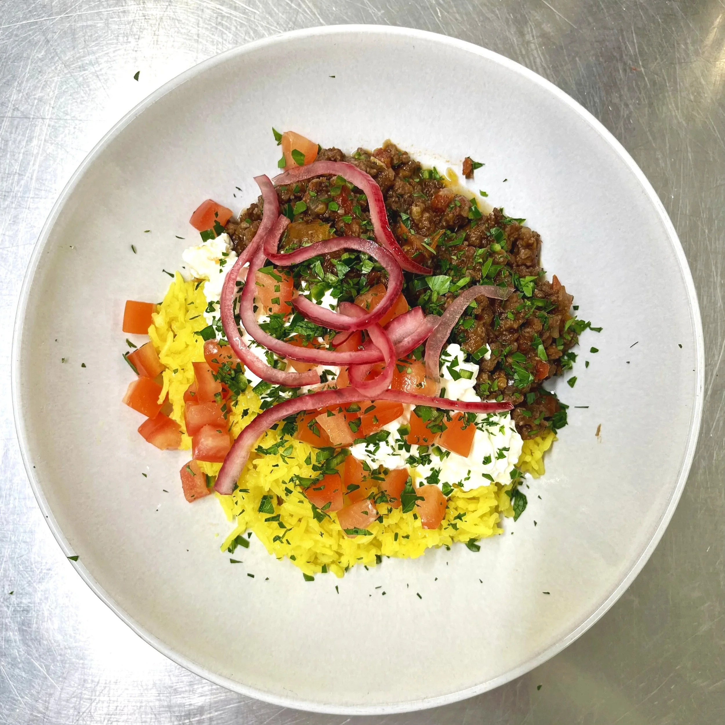 Ethopian+slow+cooked+beef+stew+with+spiced+rice+topped+with+sweet+pickled+red+onion.jpg