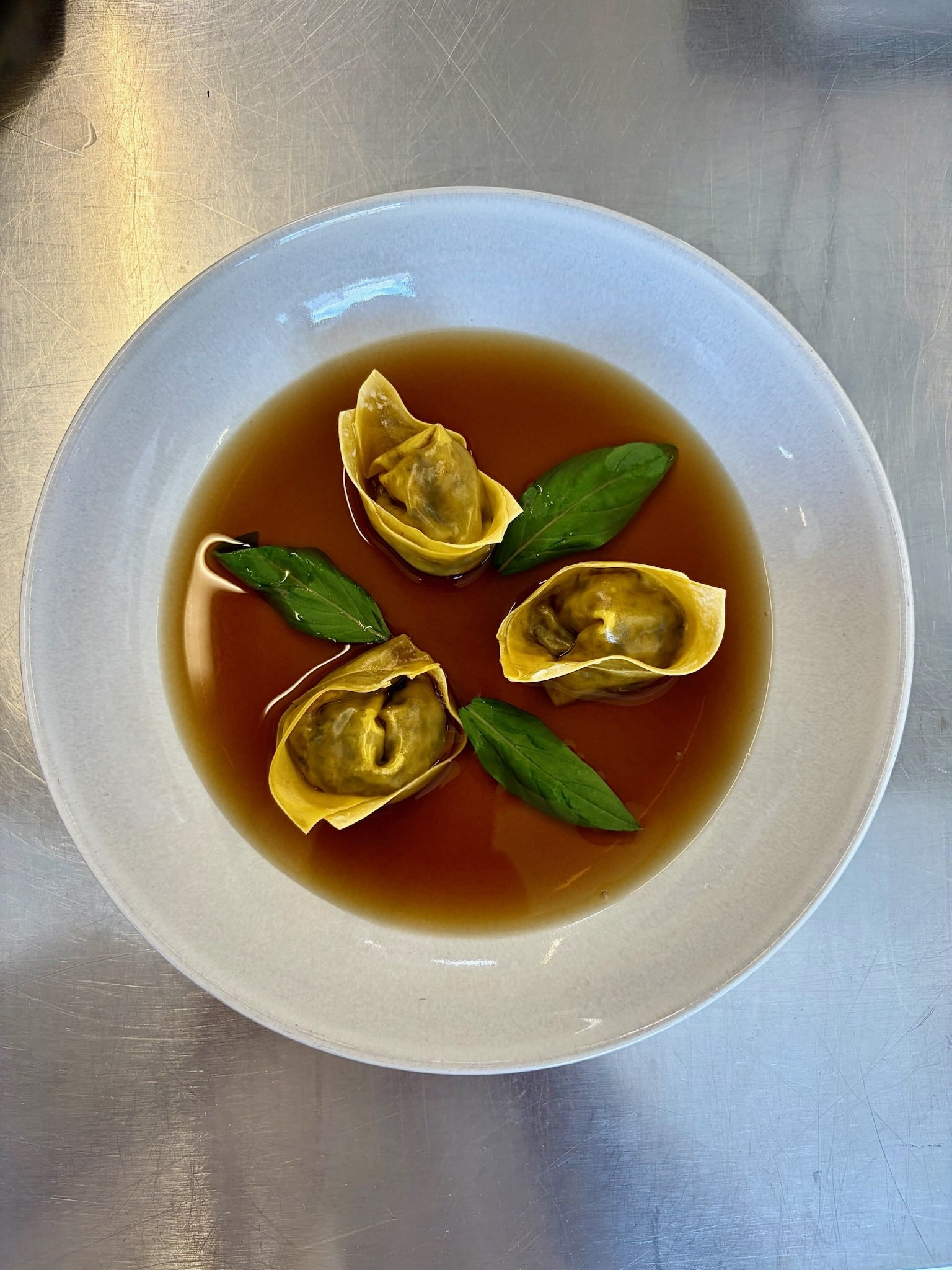 Mushroom consommé and wontons.jpeg