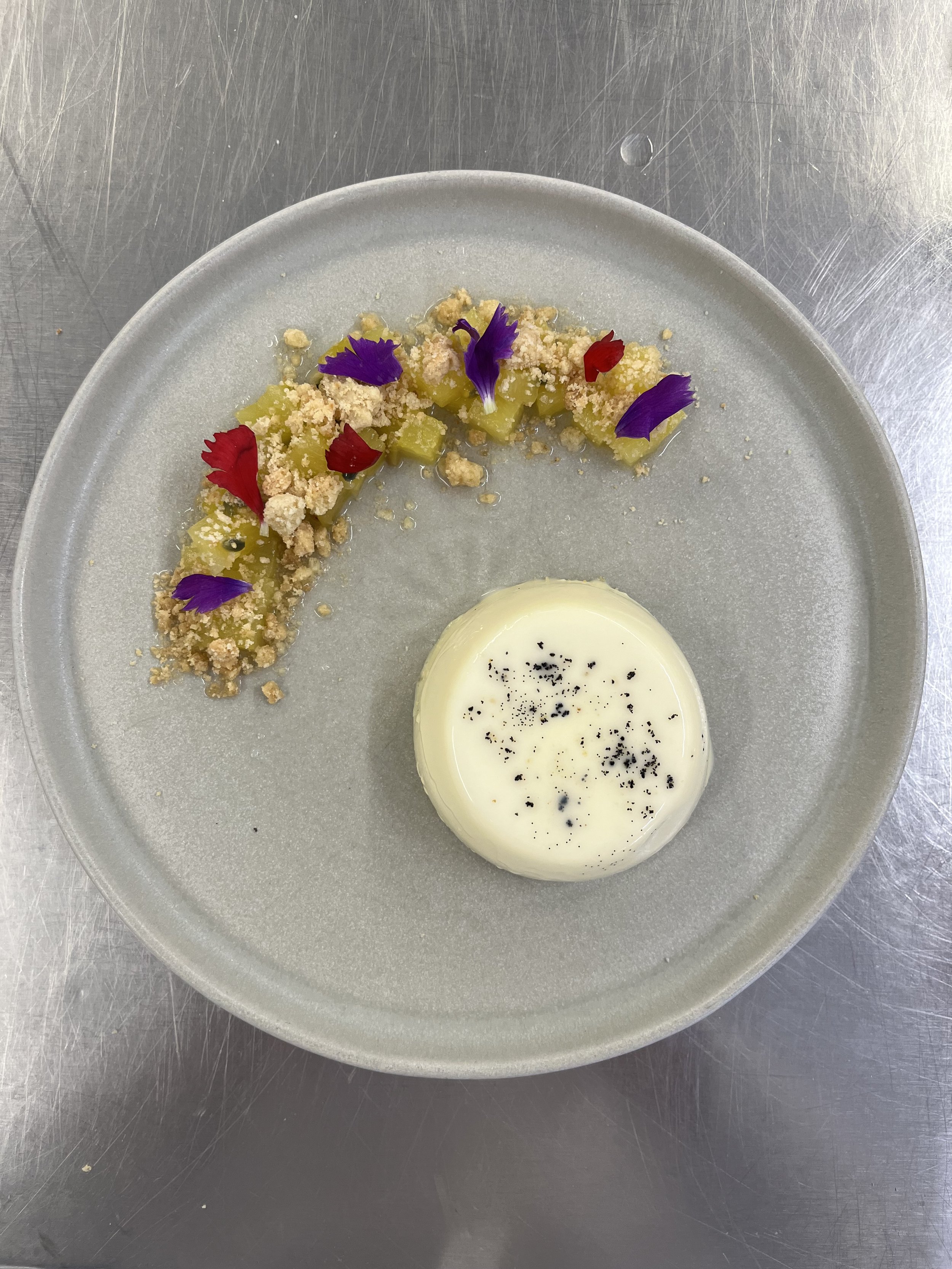 Vanilla panna cotta with spiced poached pineapple and almond crumb.jpeg