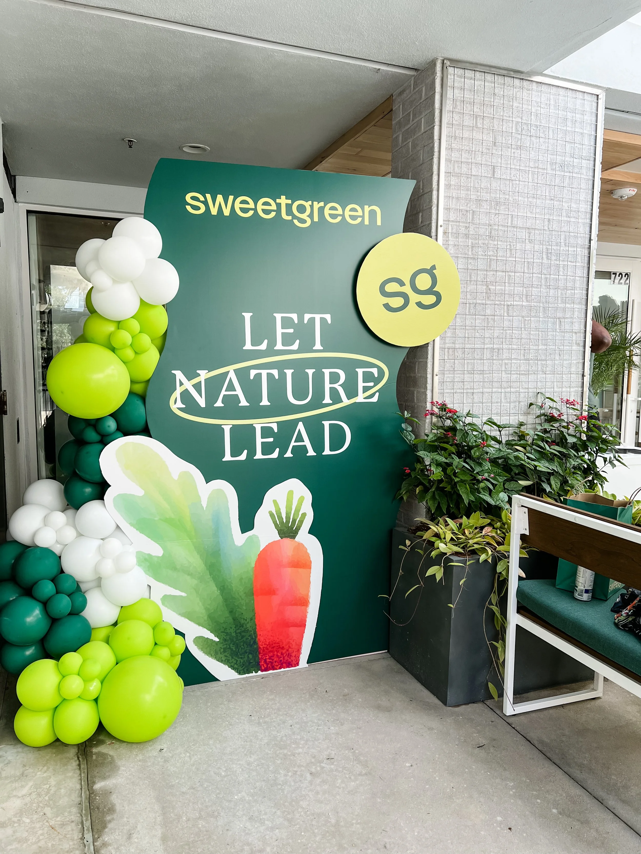 Custom Branding Backdrop with a Balloon Garland