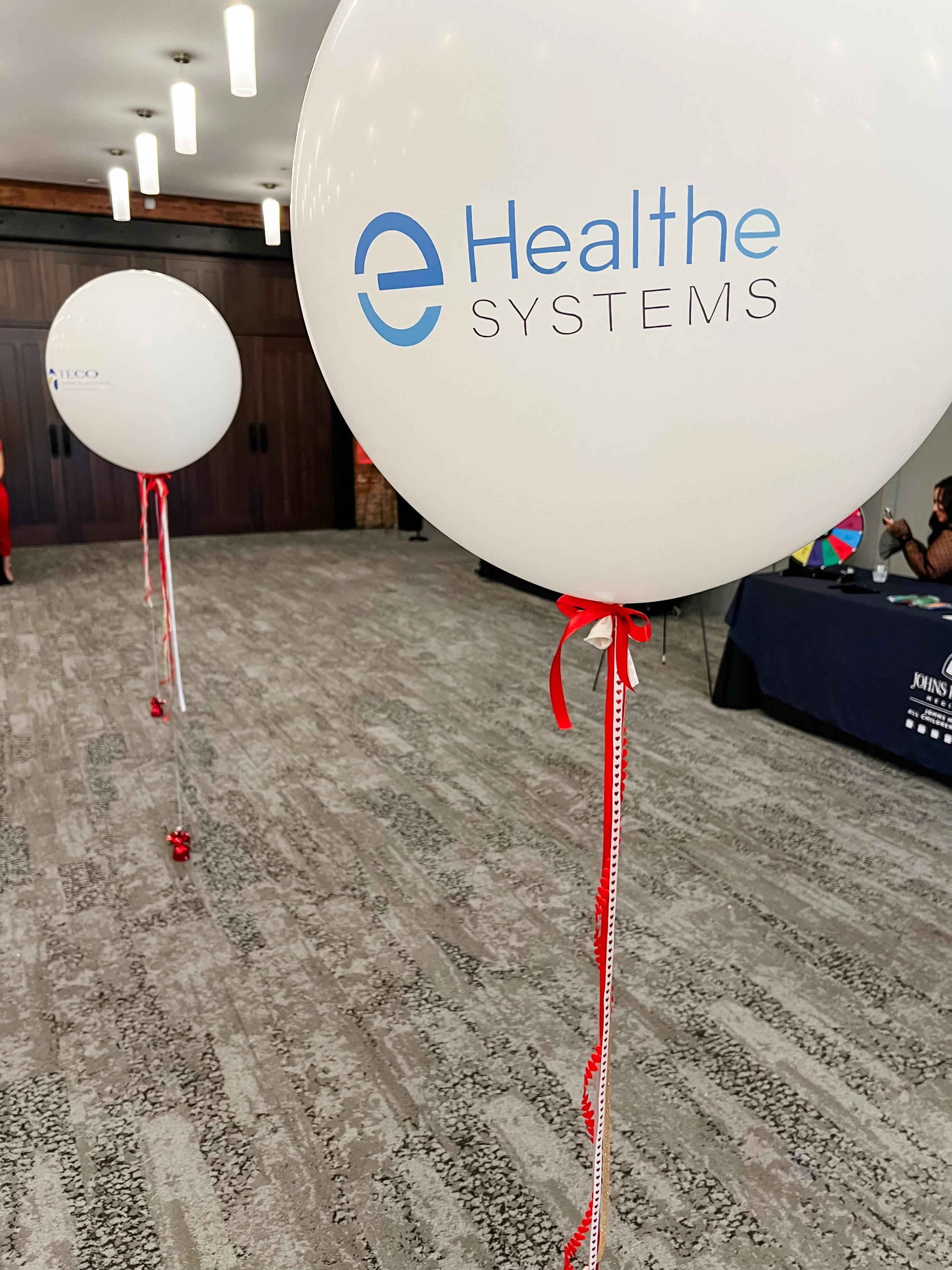 Jumbo Helium Balloons featuring Event Sponsor Logos