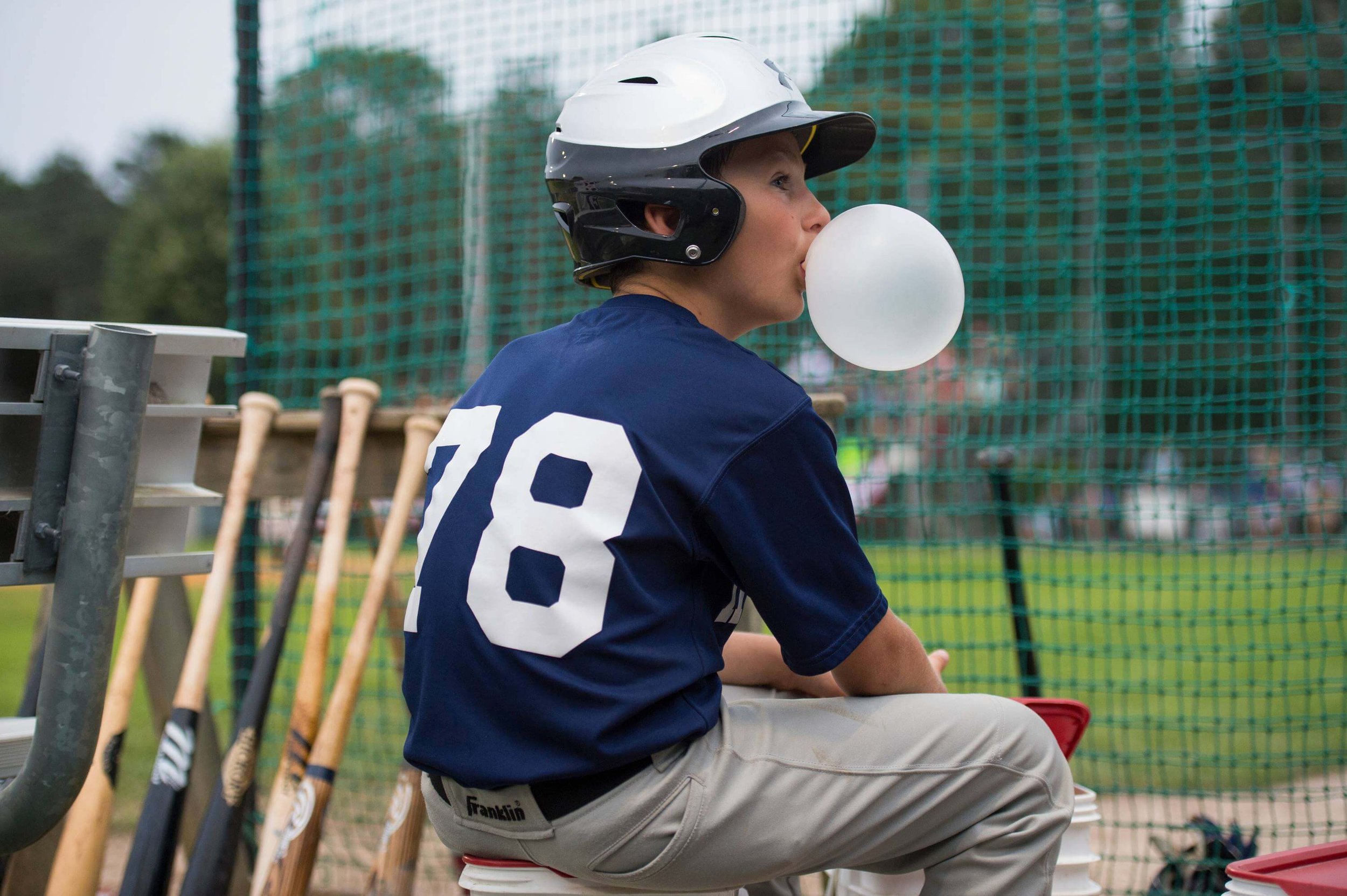 DeanneFitzmaurice_SportsCulture-16_CapeCodBaseballBatboy.jpeg