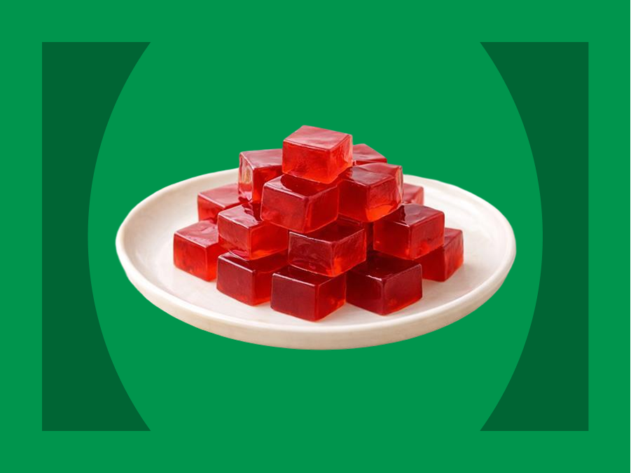 Pomegranate Gut Gummies on a white serving platter