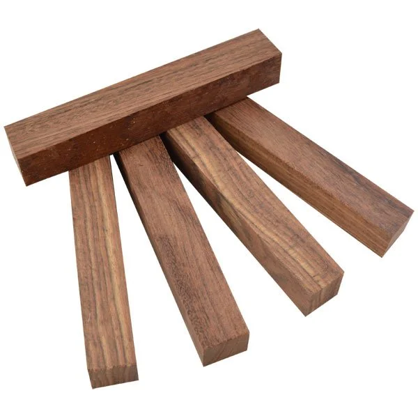 Five wooden planks and one wooden block arranged in a star shape