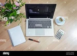 Calculator with keyboard and cup.jpg