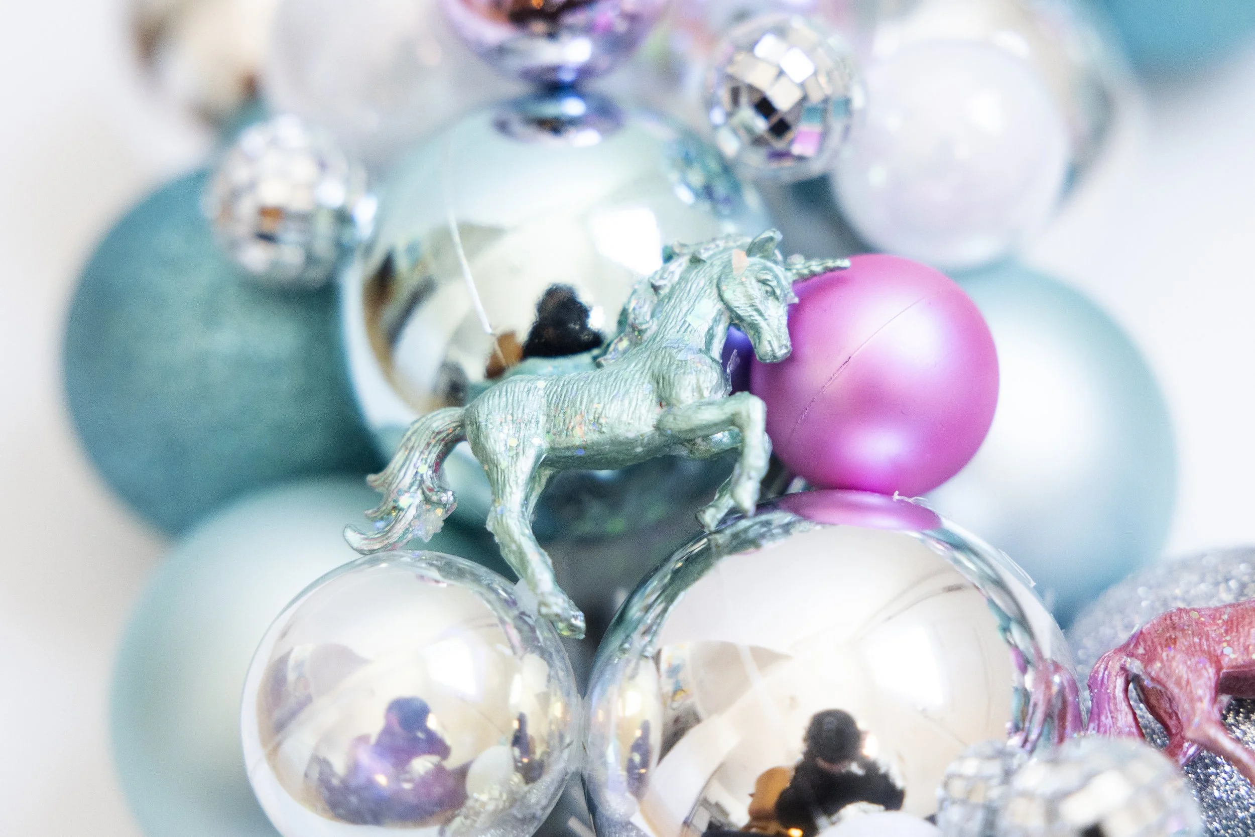 Blue unicorn on handmade ornament wreath