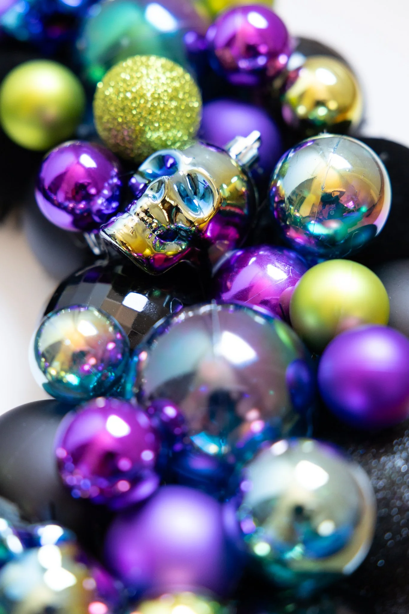 Shiny Halloween ornament wreath with iridescent skulls