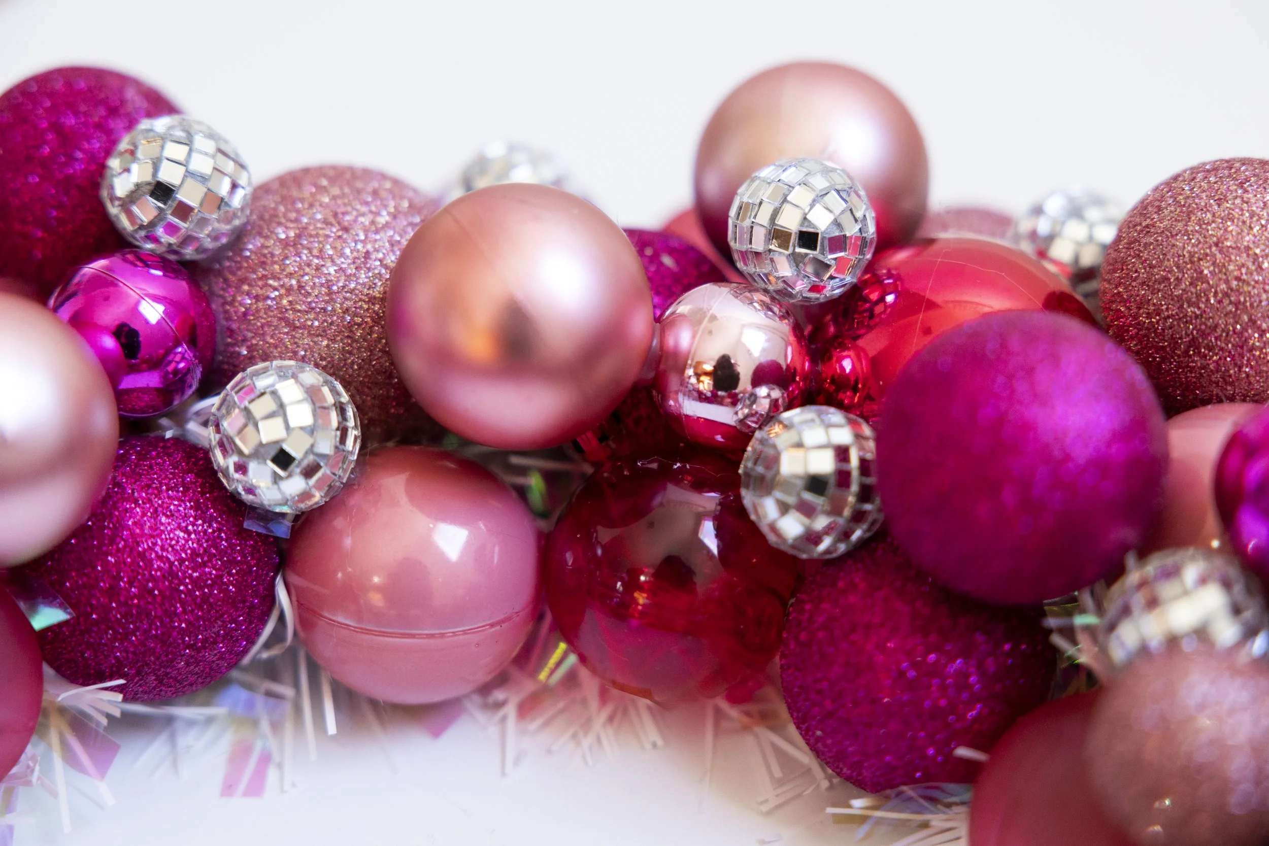 Handmade pink ornament wreath with disco balls