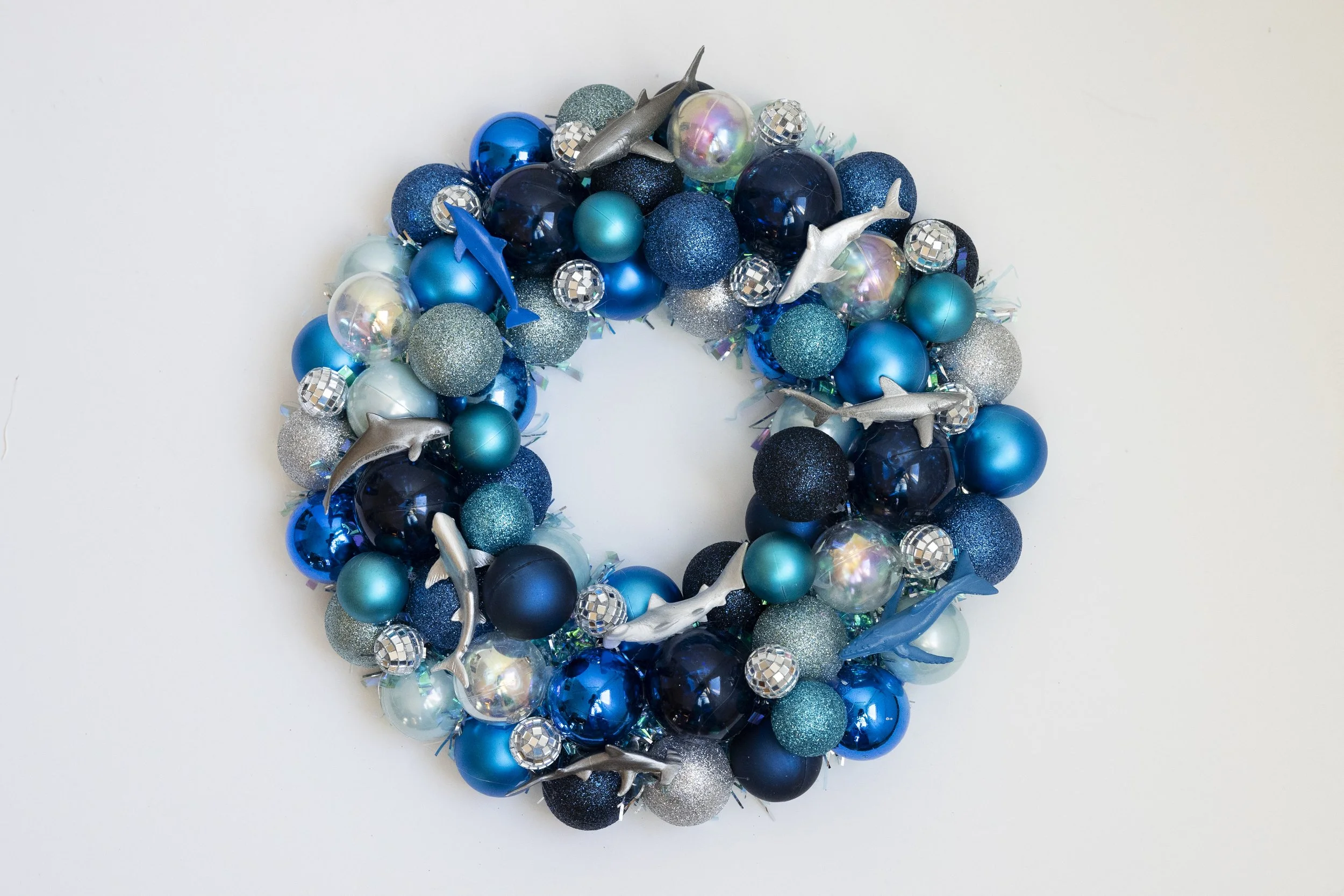 Blue ornament wreath made with sea creatures and disco balls