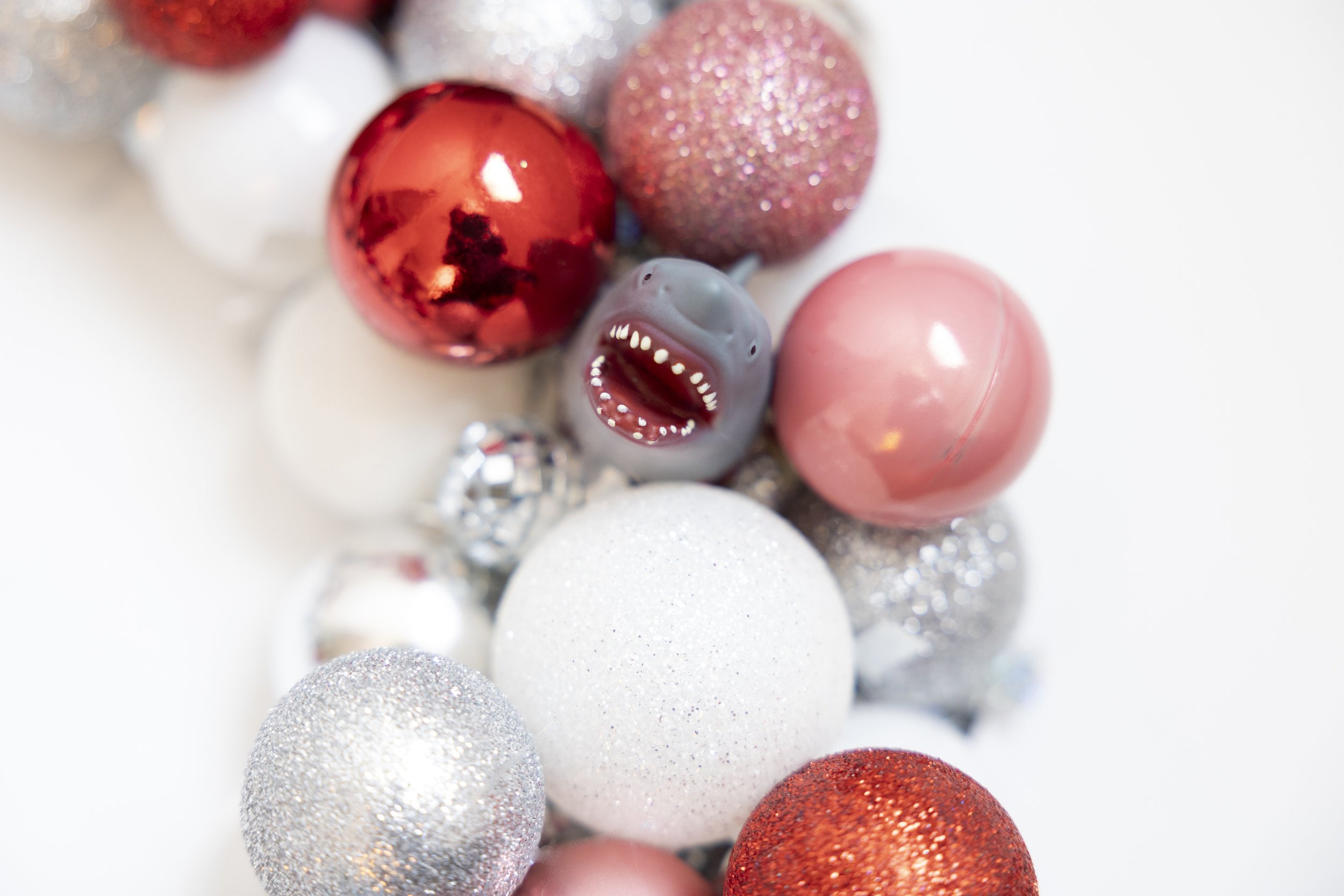 Colorful shark wreath made with ornaments and disco balls
