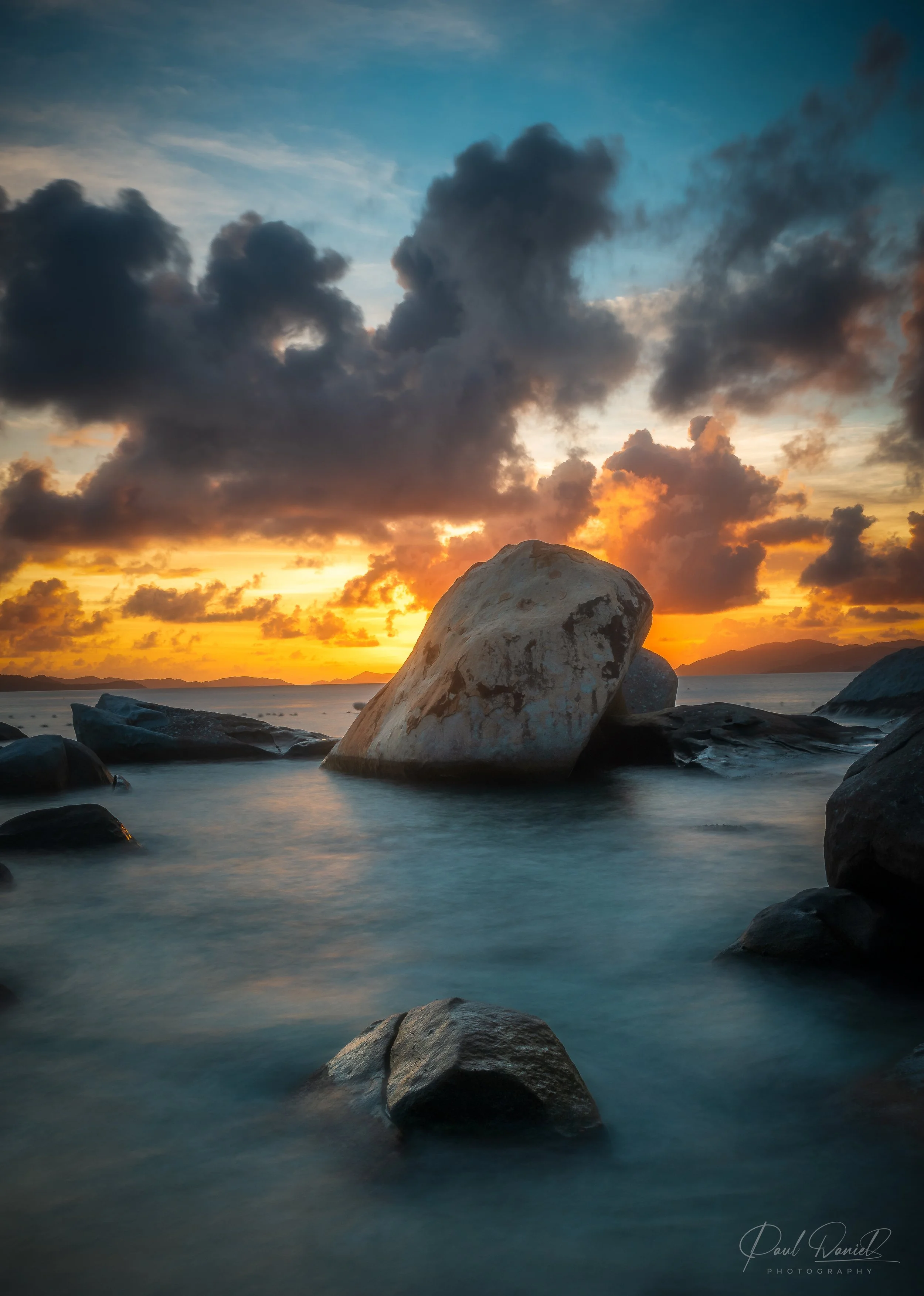 Fiery sunset over the granite boulders of The Baths -- Virgin Gorda, BVI 