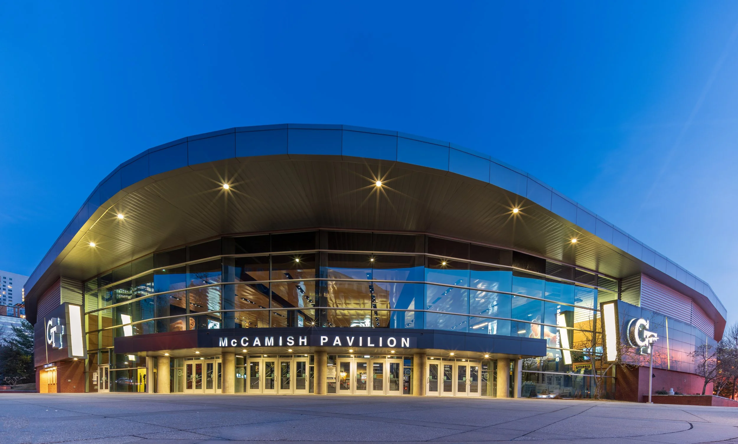 Wide-angle twilight view of McCamish Pavilion, home of Georgia Tech Yellow Jackets basketball, in Atlanta, GA