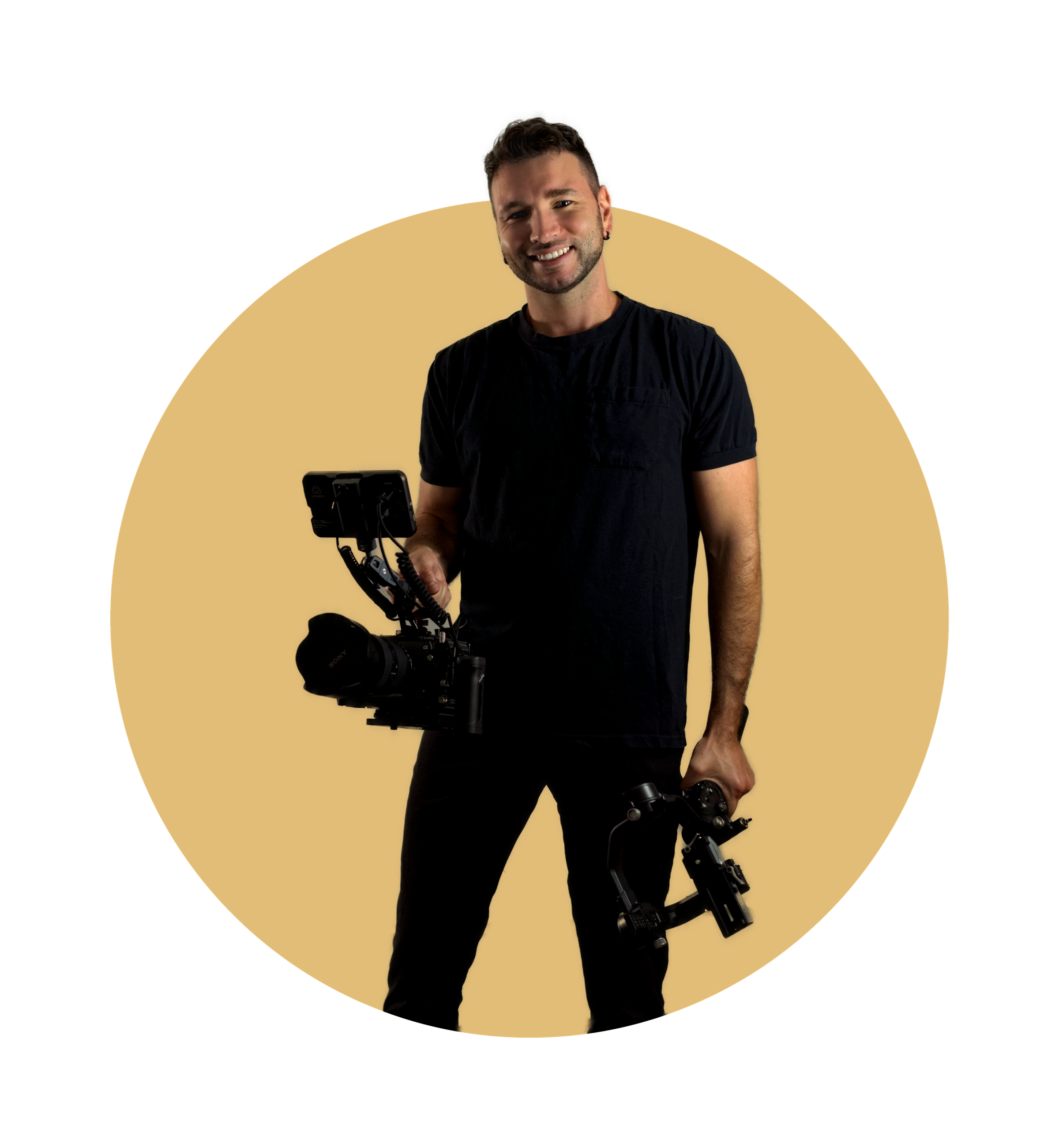 A smiling man holding a camera stabilizer and a camera, standing against a yellow and black artistic background.