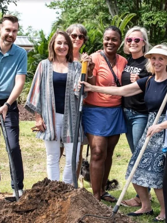 Keystone founder Dr. Kesia Blenn with nonprofit leaders and a city commissioner during a community tree-planting event at Oaks by the Bay Park in Panama City, Florida.